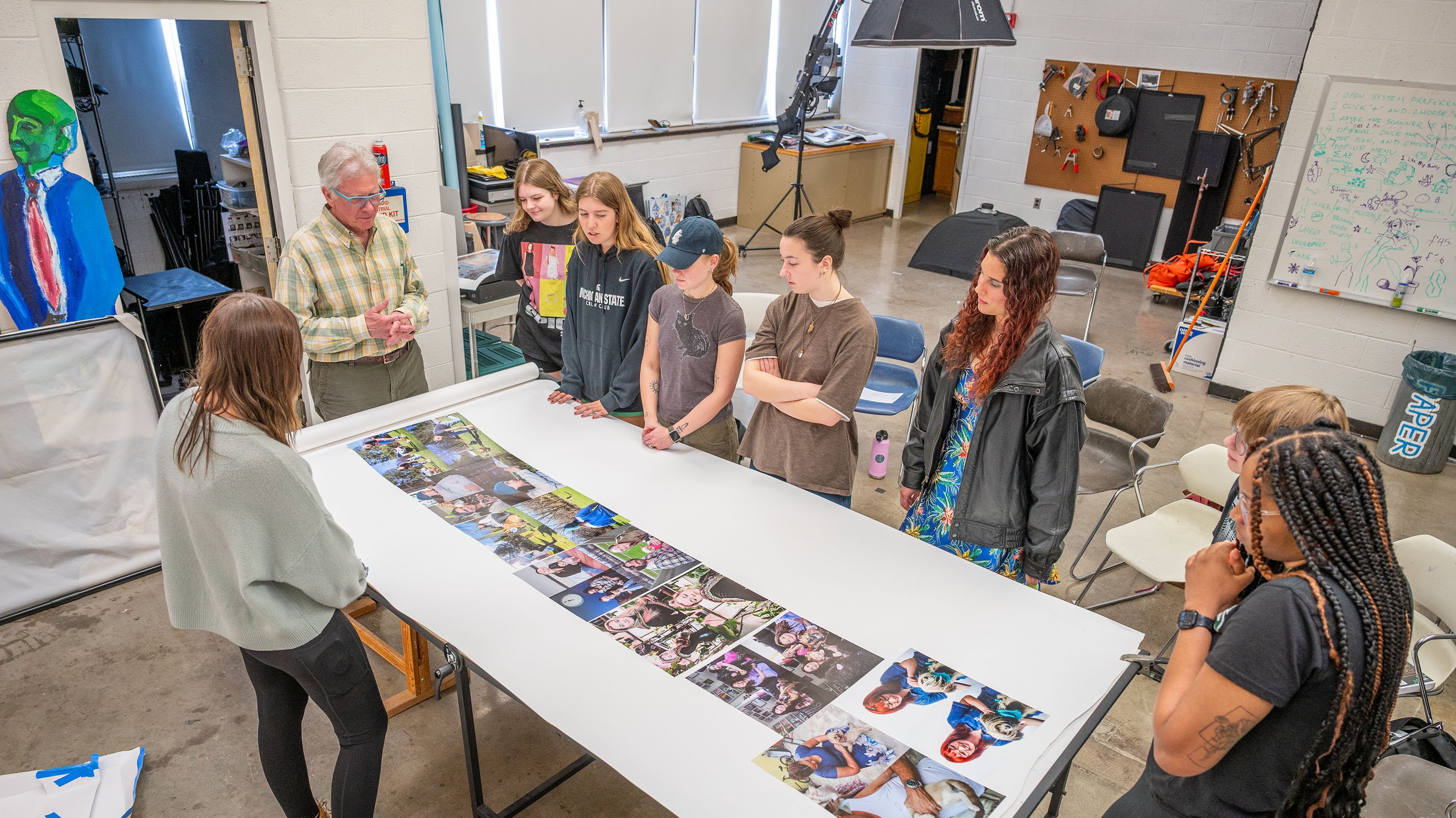 Students critiquing photography