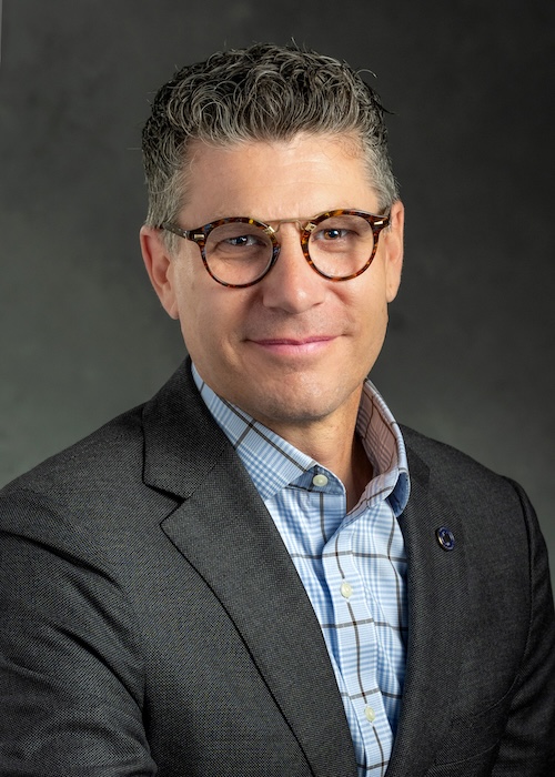 Headshot of Devon Akmon.