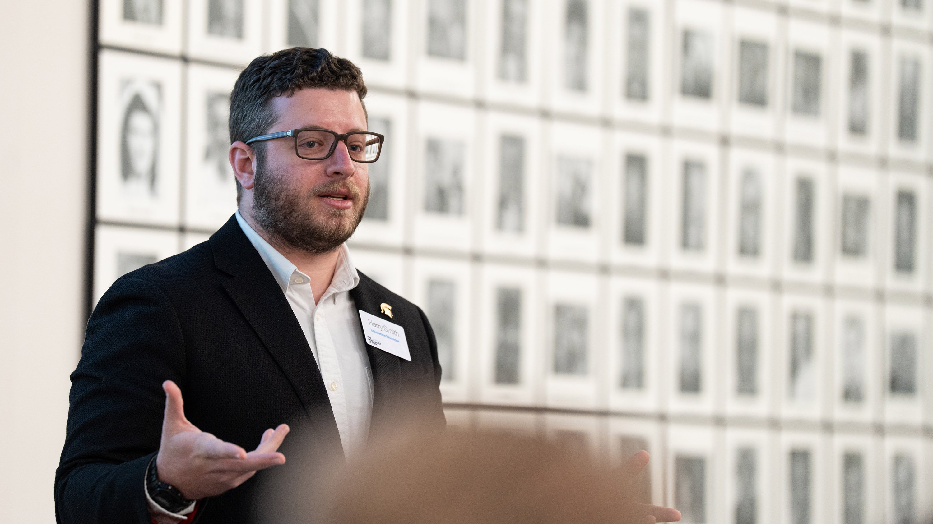 A man speaking at a podium