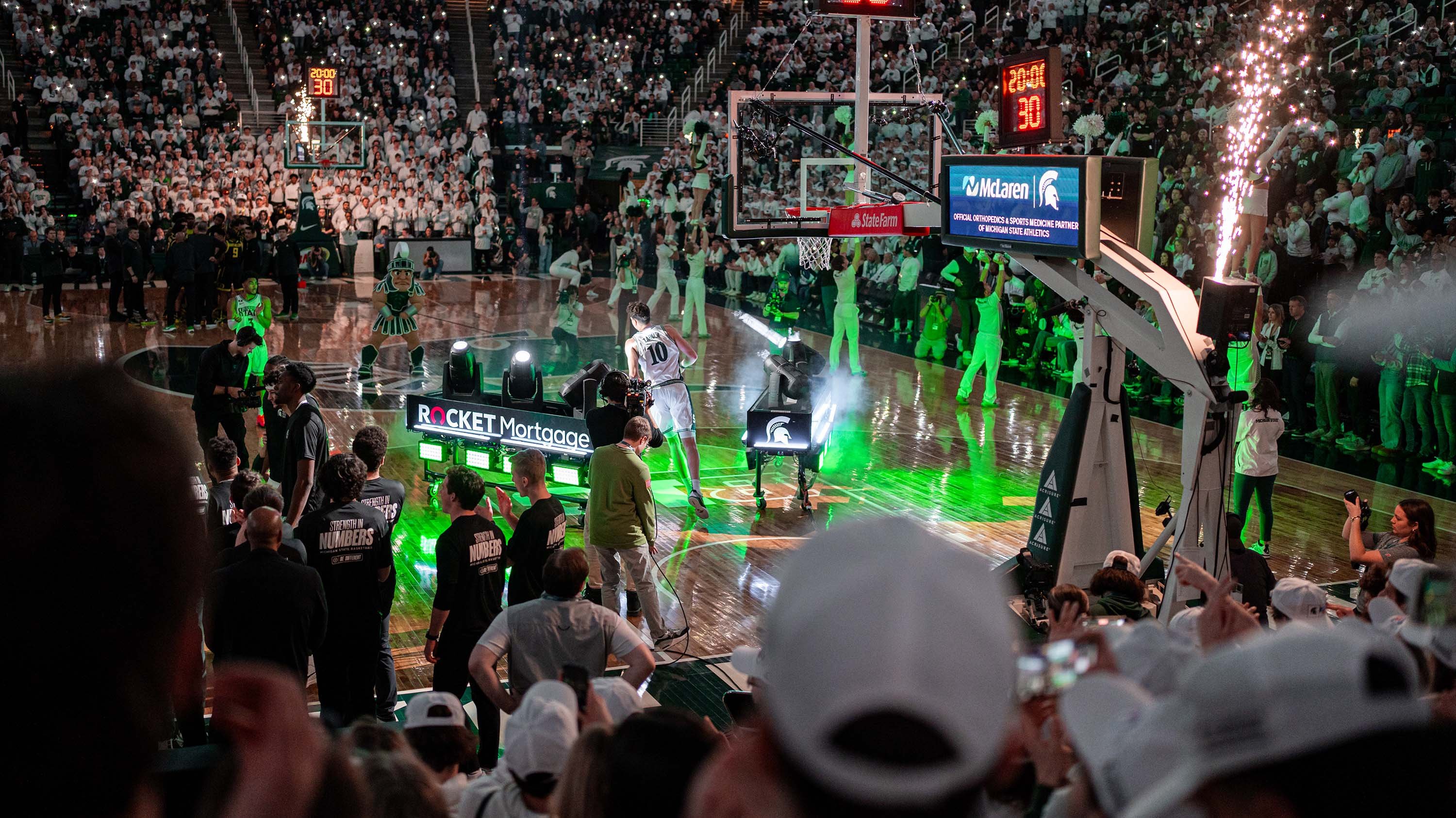 MSU men's basketball team entering the court during a home game