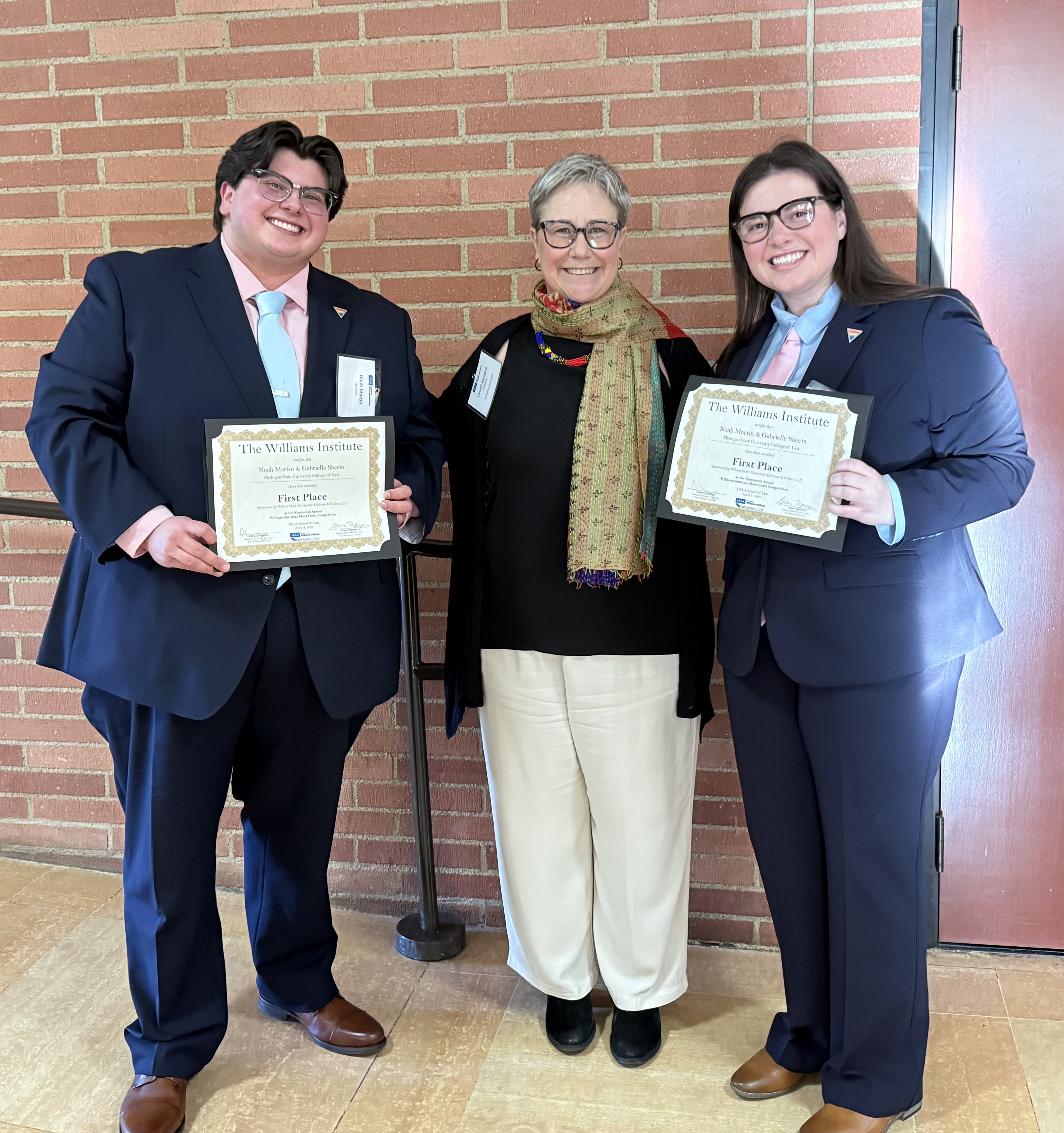 Noah Martin; Lauren Sprague, research director and Blachford/Cooper Distinguished Scholar at the Williams Institute; Gabby Sheets