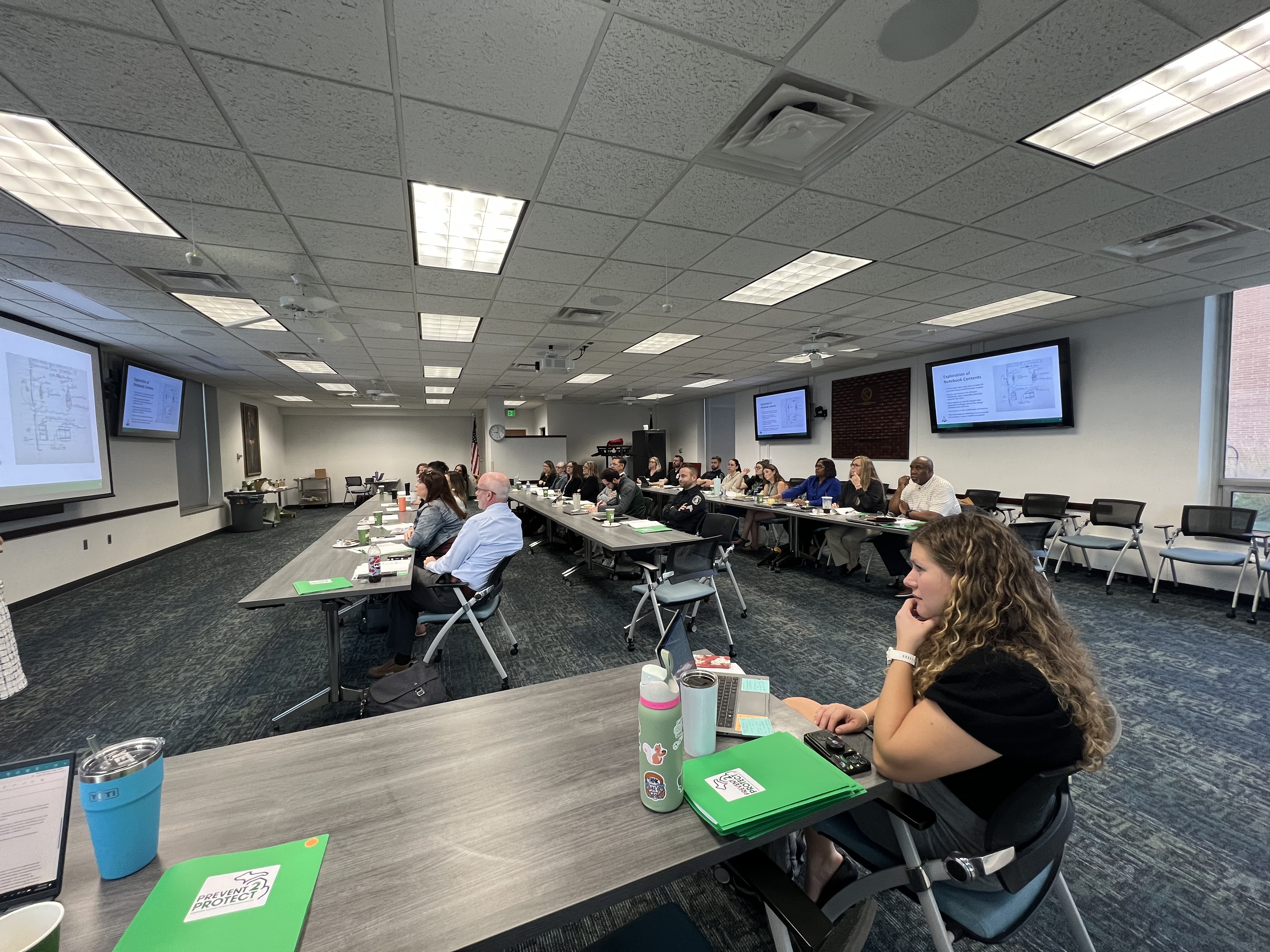 Educators and law enforcement personnel from the Ingham Intermediate School District attend a Prevent 2 Protect training session in preparation for program implementation.