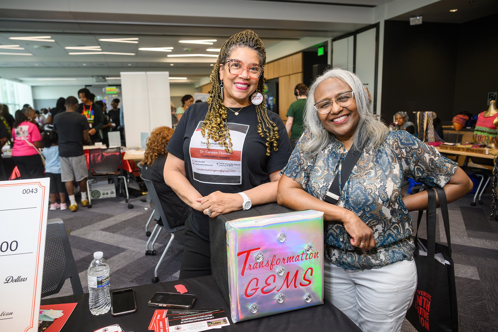 Two participants of the MSU Juneteenth Celebration Black Wall Street Vendor Fair