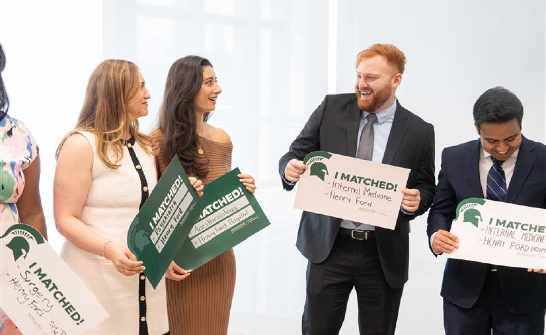 David Agemy (second from right) was one of 86 Spartans to match at Henry Ford Health. Agemy matched in internal medicine at Henry Ford Hospital. Neal Doshi (right) matched in internal medicine at Henry Ford Hospital. Photo credit: Henry Ford Health, Everett Cislo 