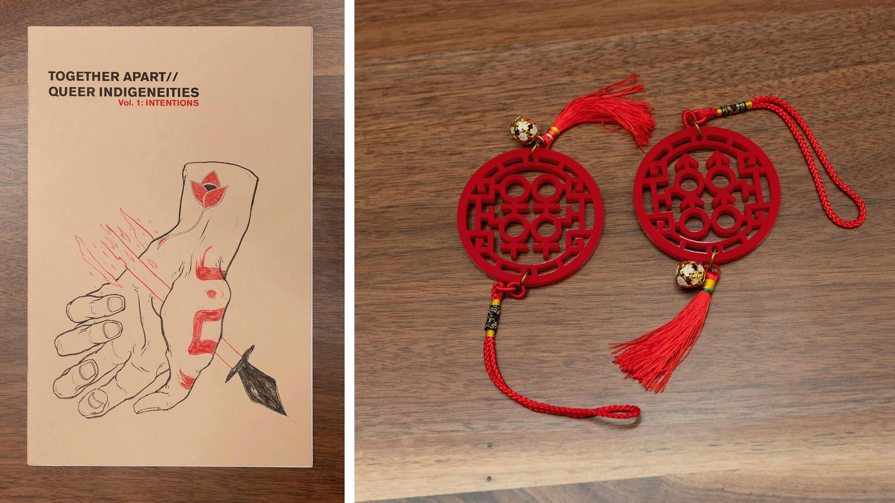 Two images. On the left is the cover of a book titled 'Together Apart: Queer Indigeneities, Vol. 1: Intentions.' The cover features a drawing of a hand with a bloody wound and a dagger. On the right is Two circular red Chinese knot decorations with intricate patterns and gold embellishments. Each knot has a red tassel and a small gold bead. They are lying on a wooden surface.