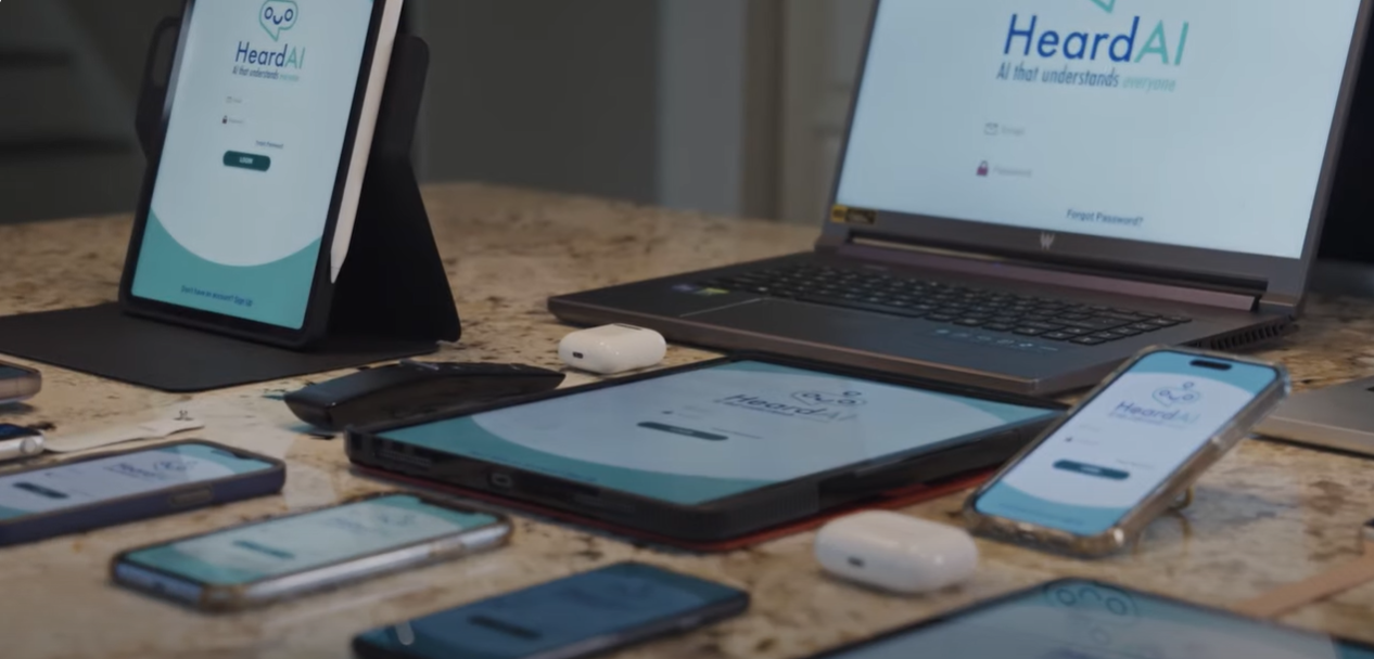 Multiple tablets, phones and screens with the login screen to the app HeardAI displayed 