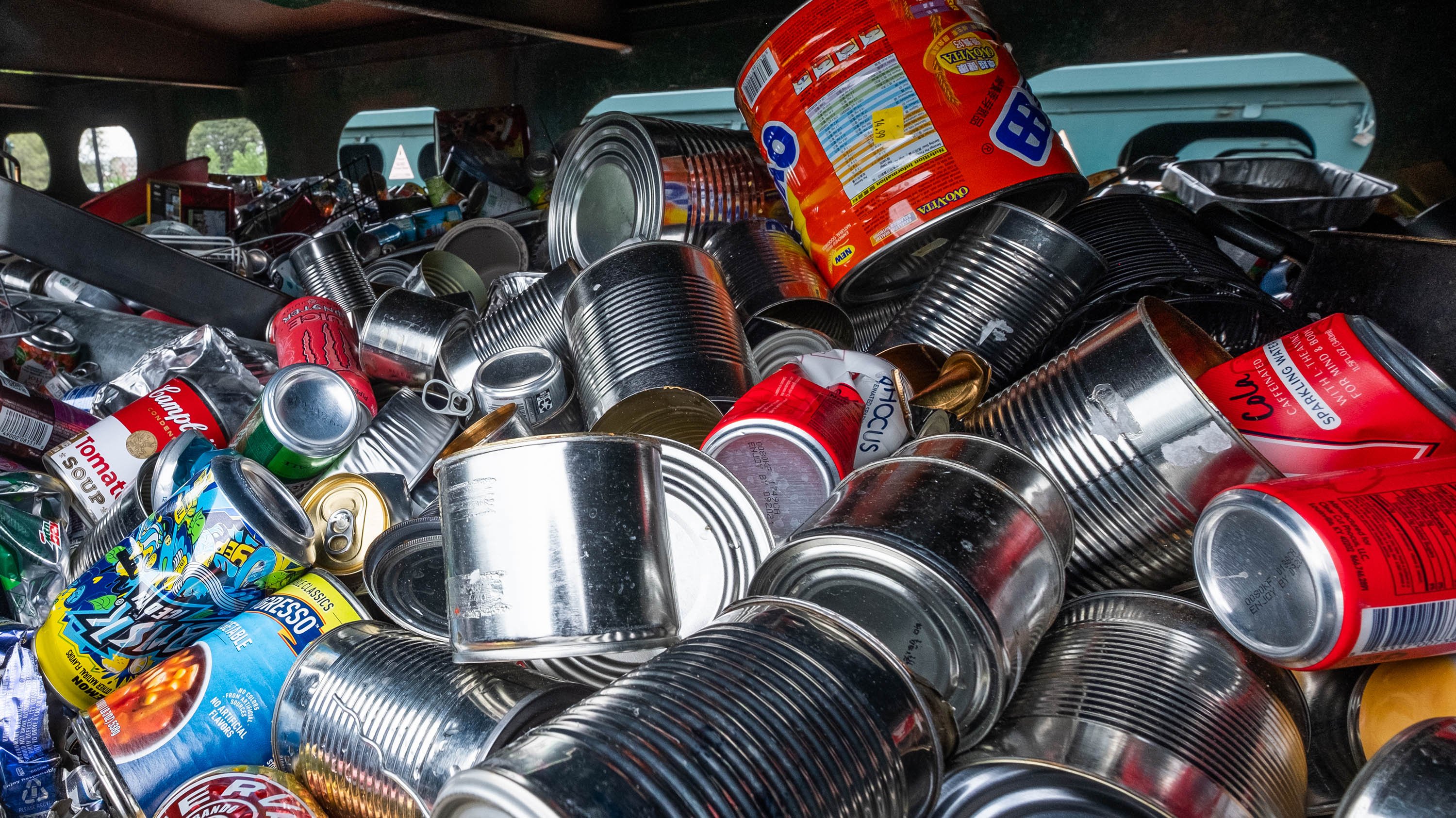 Cans in a recycling receptacle