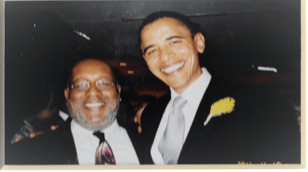 Moore in Atlanta with then-Senator Barack Obama at an event.