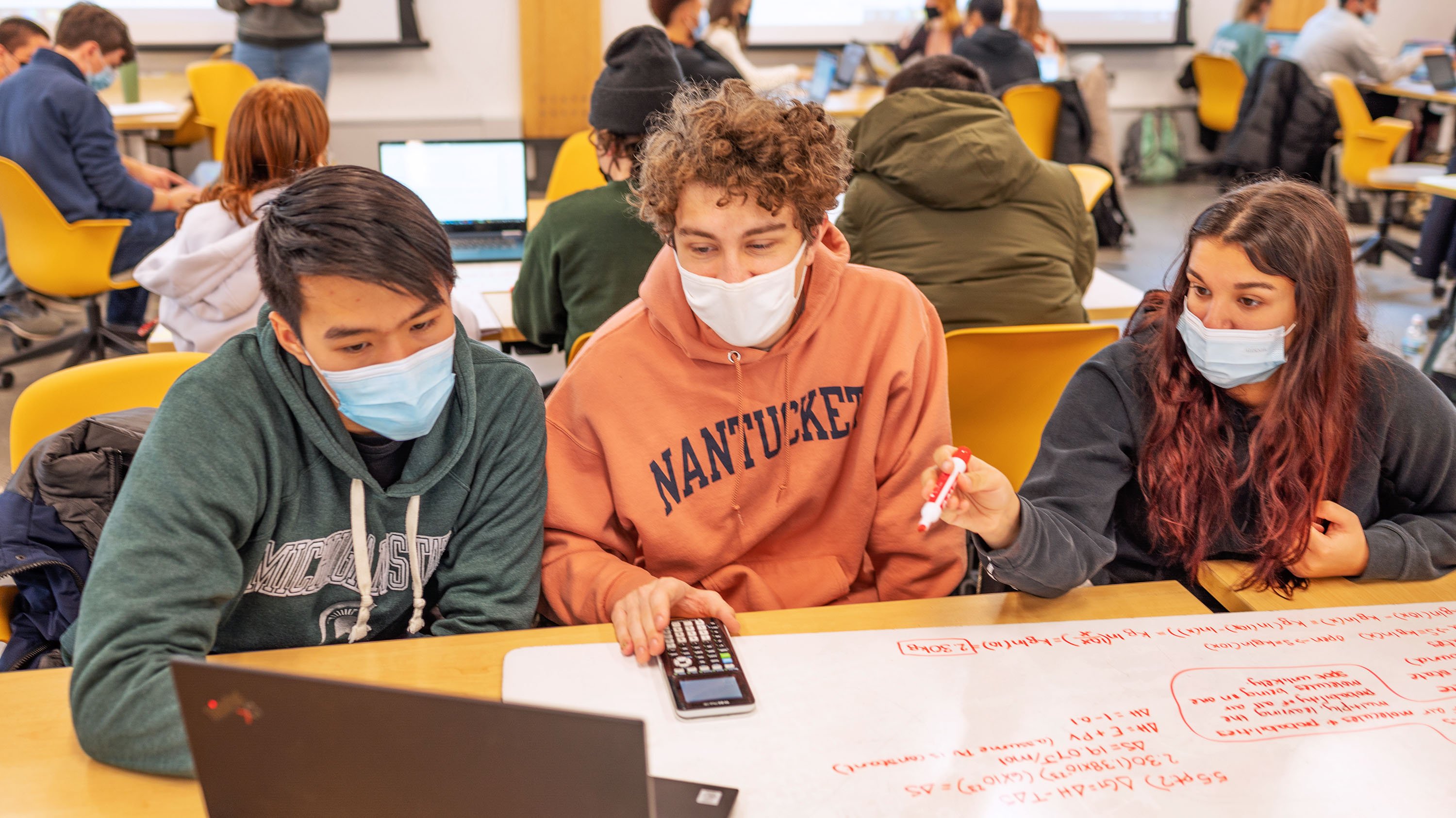 Students working together in a physics class