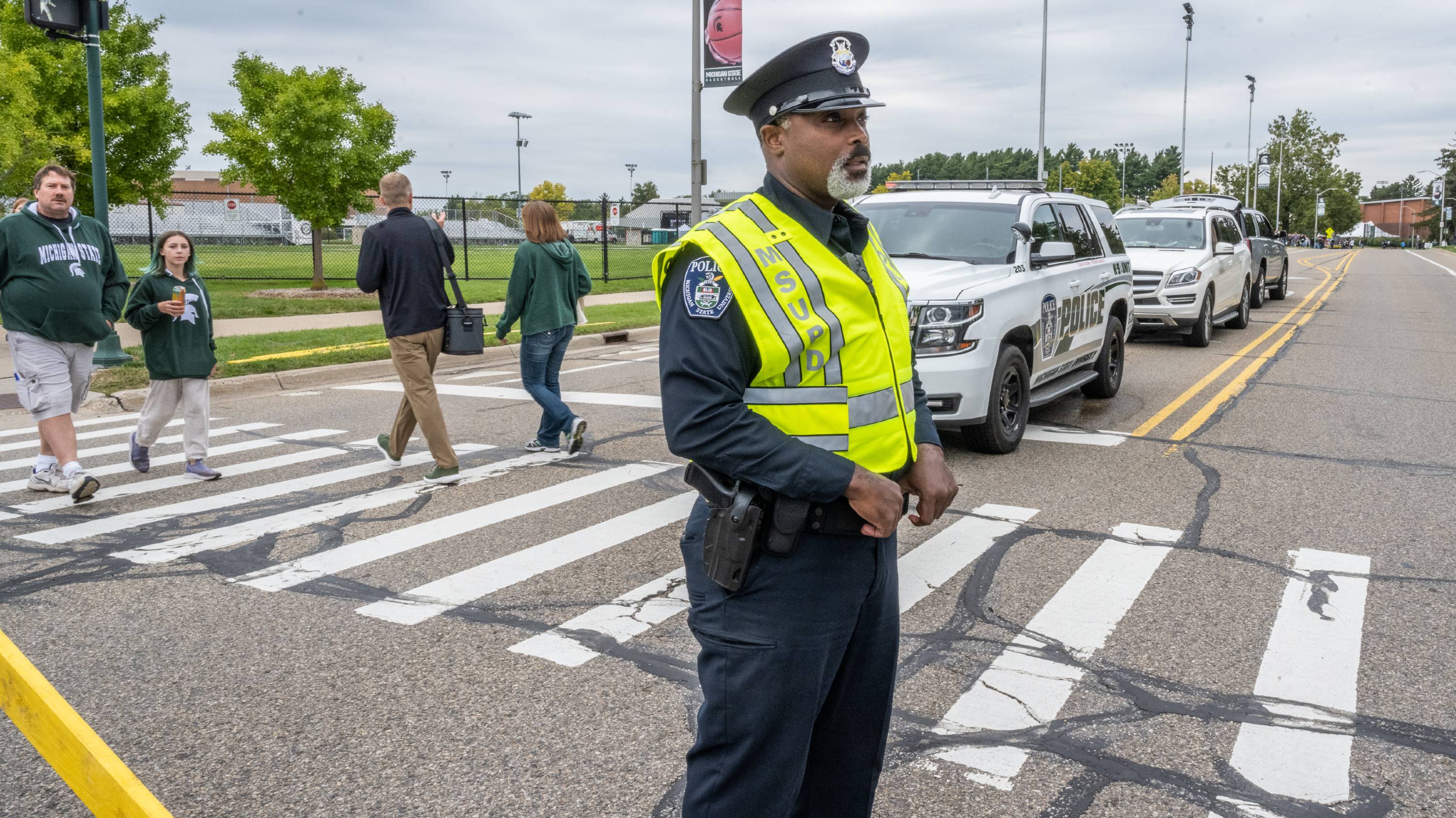 Det. Dave Isabell directs traffic on campus.