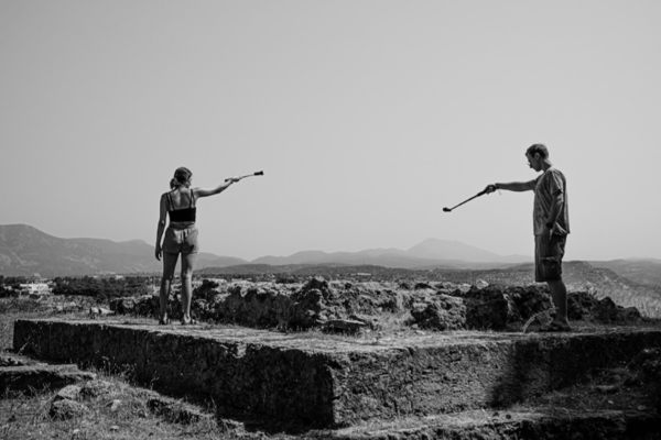 Alyssa DeTorrice and Stephen Bush, on the Isthmia study abroad this past summer who are using GoPro cameras to capture images that will be used to build a model of this temple podium.