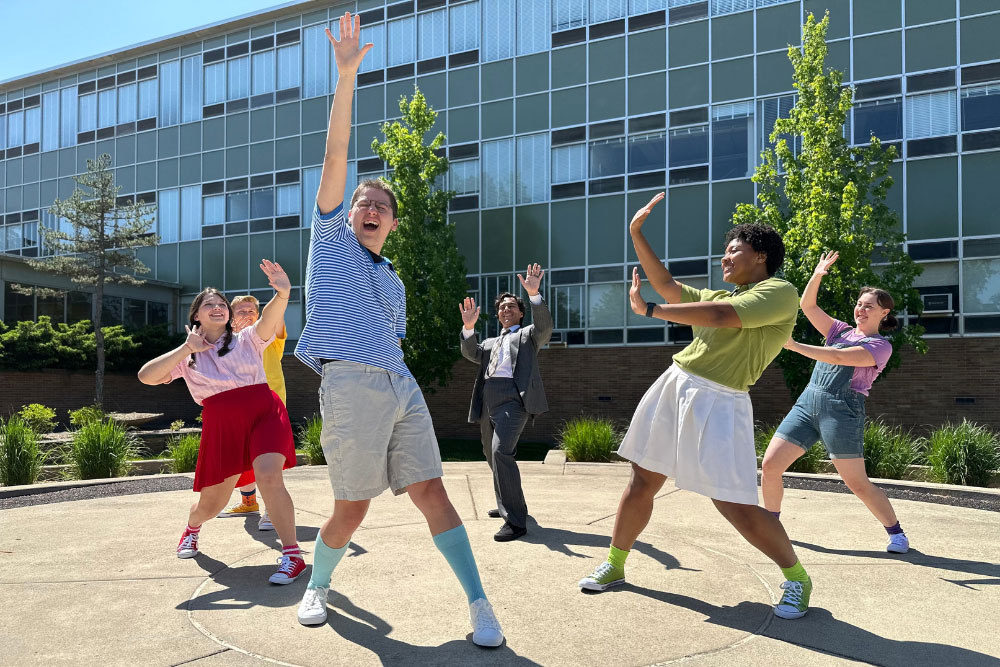 Performers dancing on MSU’s campus.
