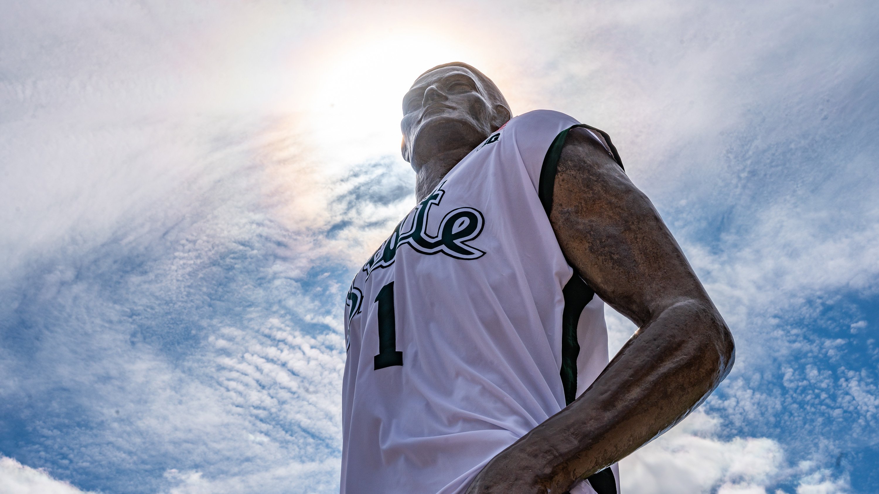 Spartan statue wearing basketball jersey