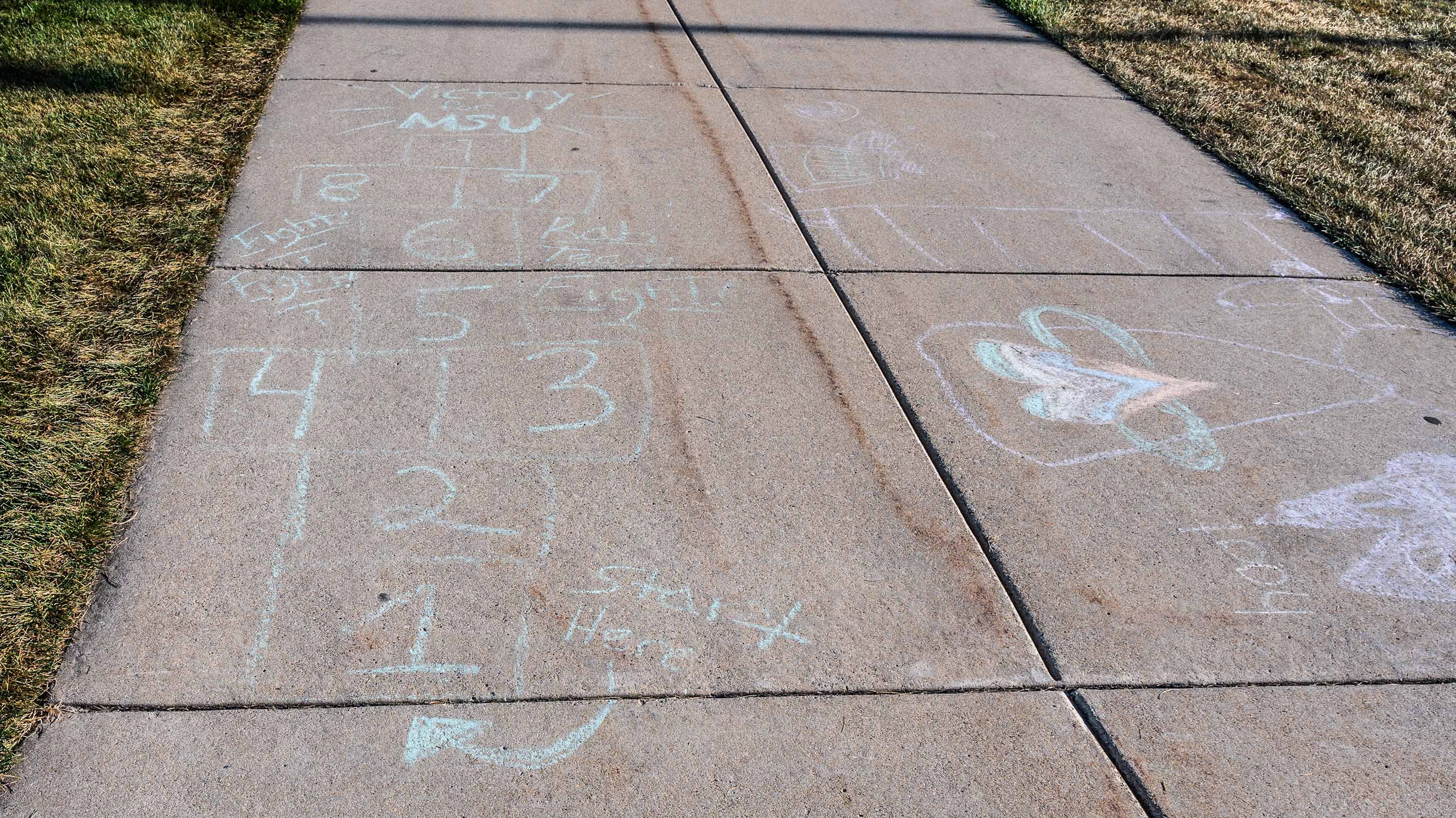 Hopscotch grid drawn with sidewalk chalk