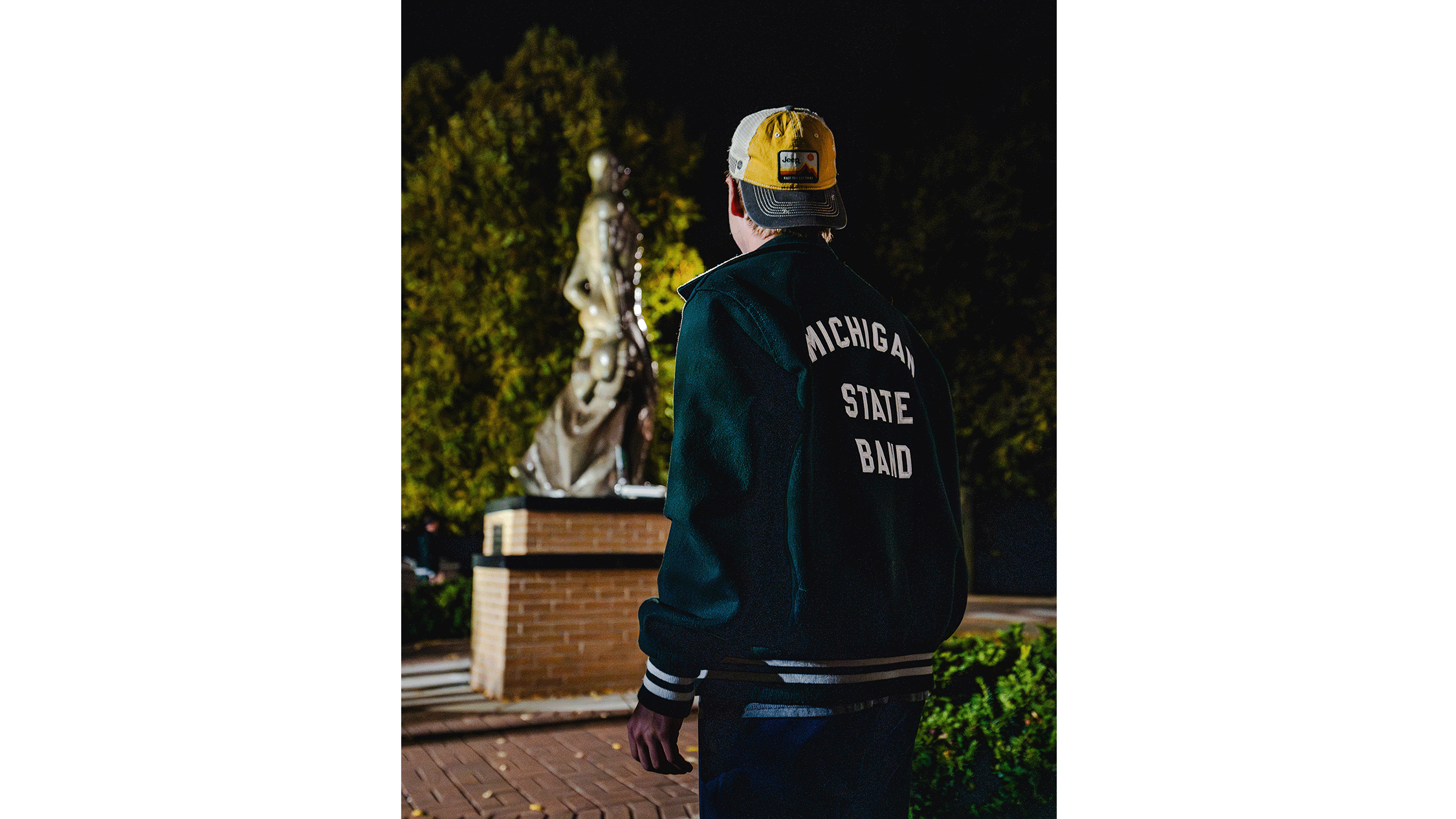 Member of the Spartan Marching Band looking at The Spartan during Sparty Watch