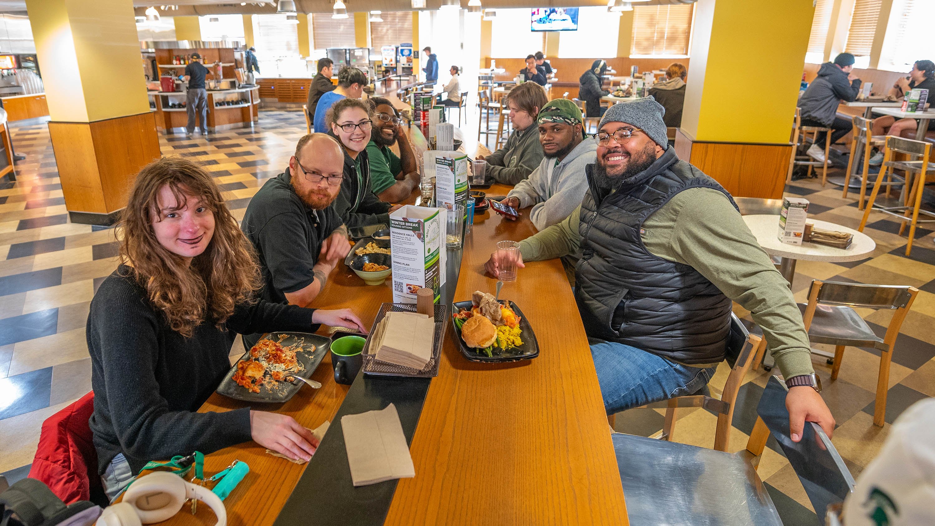 MSU staff members at a dining hall table