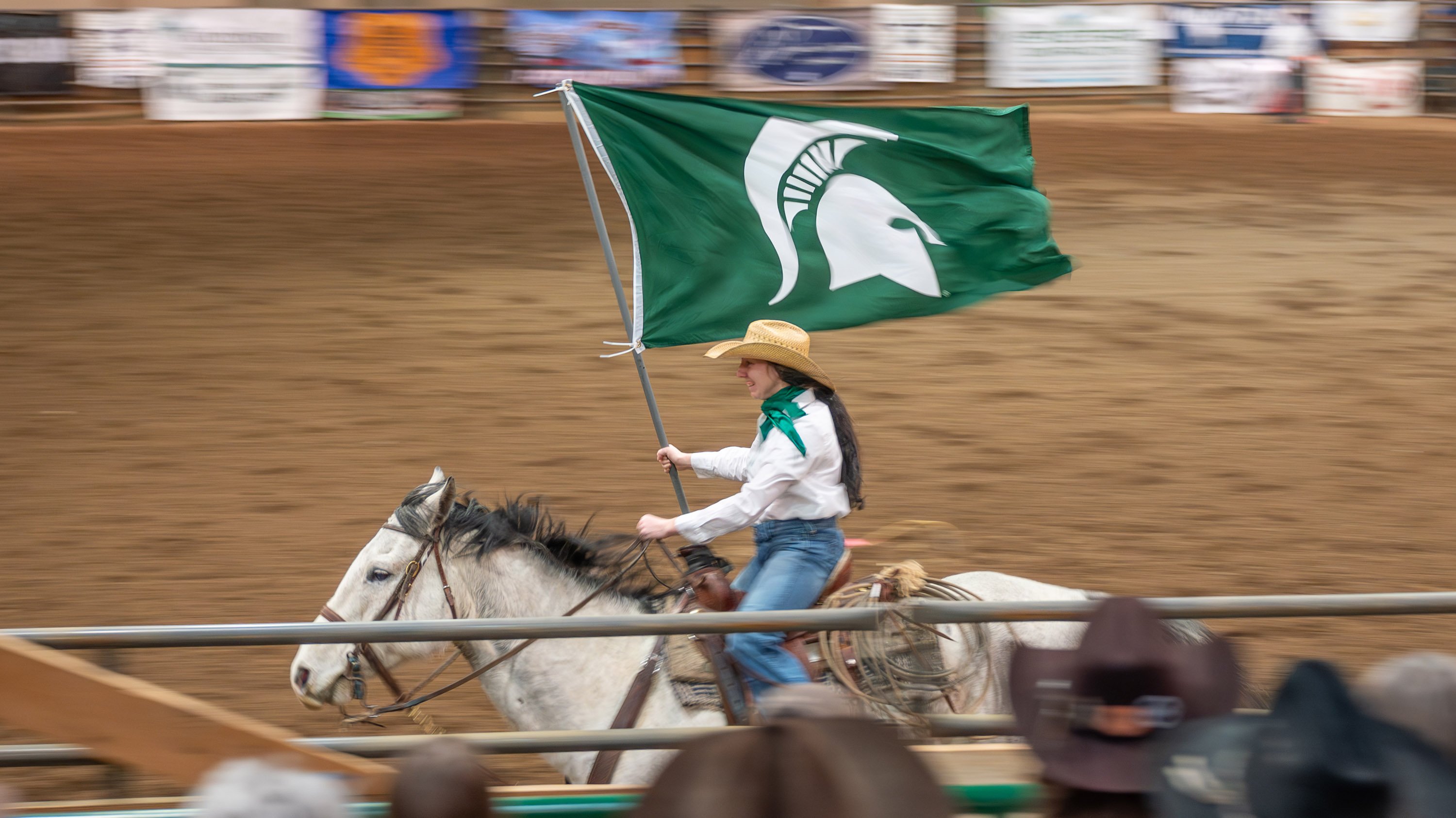 Horse rider with MSU flag at Spartan Stampede