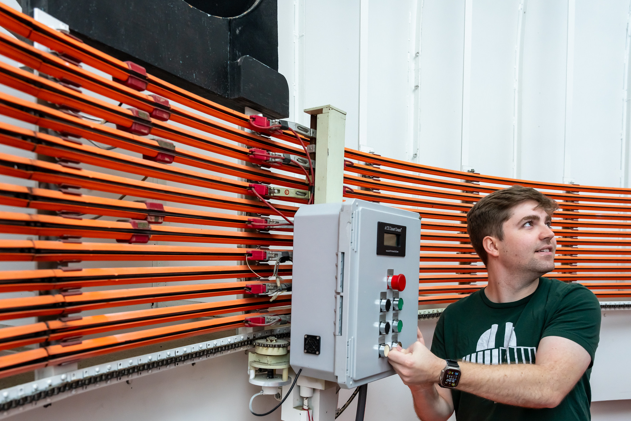 Jack Schulte adjusts the MSU Observatory research telescope.