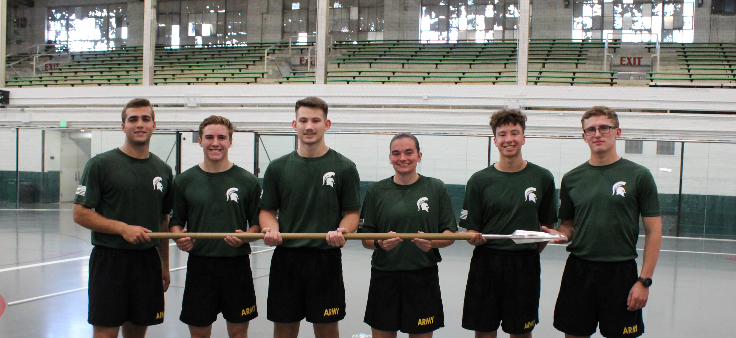 cadets in the Leadership Lab stand together and smile for the camera