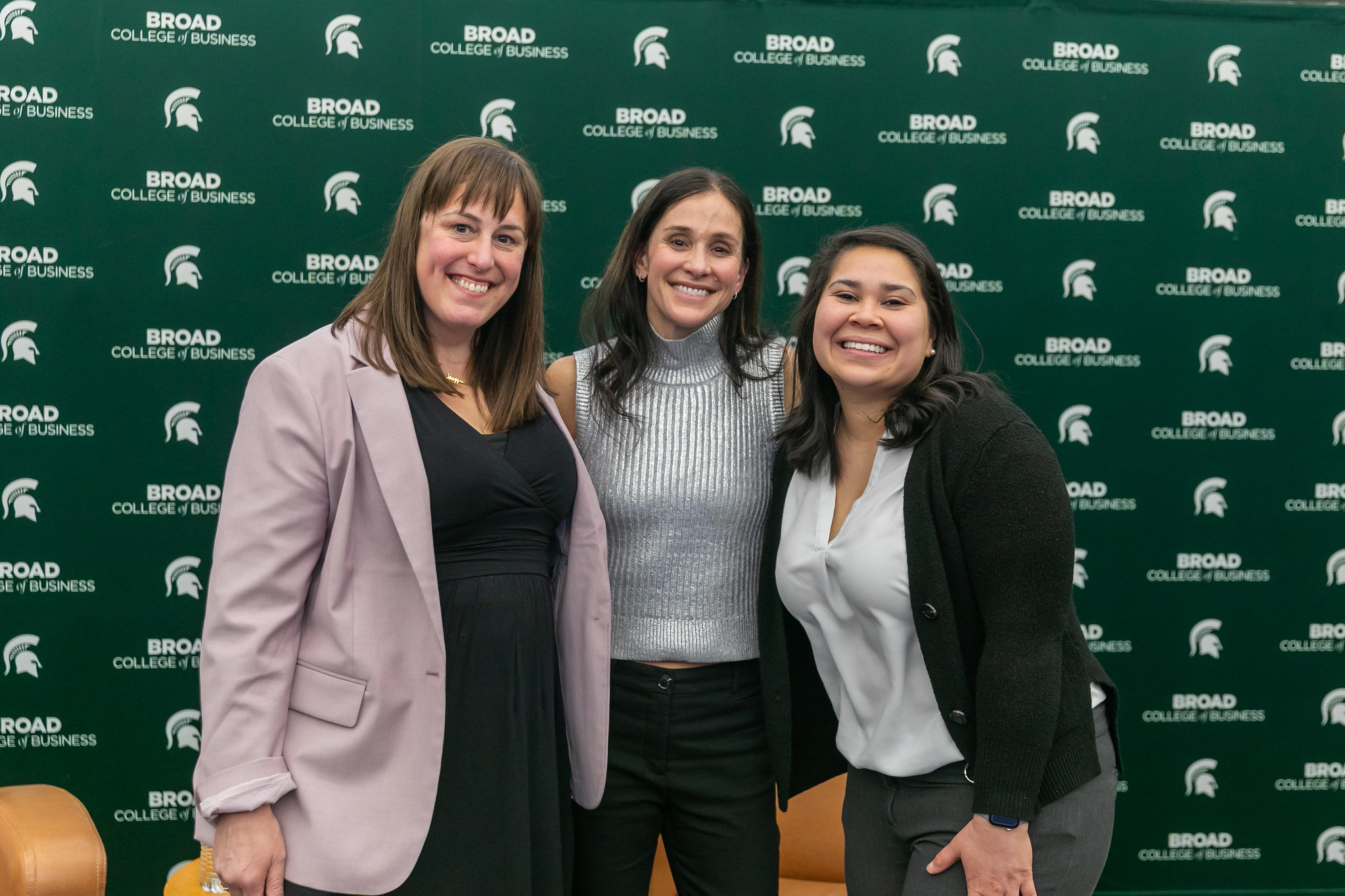 Elizabeth Hammond, Kara Goucher and Ana Lesage pose for a photo before Kara gives her talk during Ethics Week 2025.