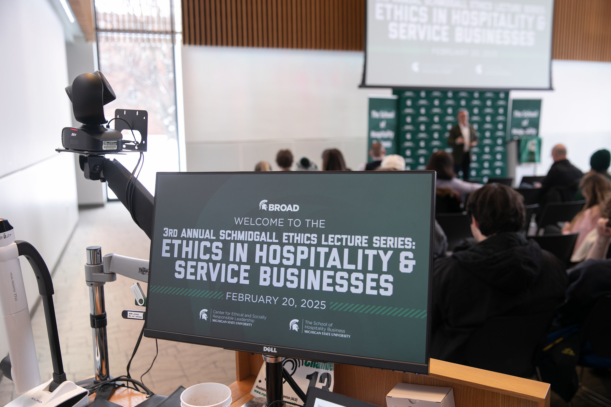 A close up of a computer screen shows a graphic for the Ethics in Hospitality and Service Businesses session during Ethics Week 2025.