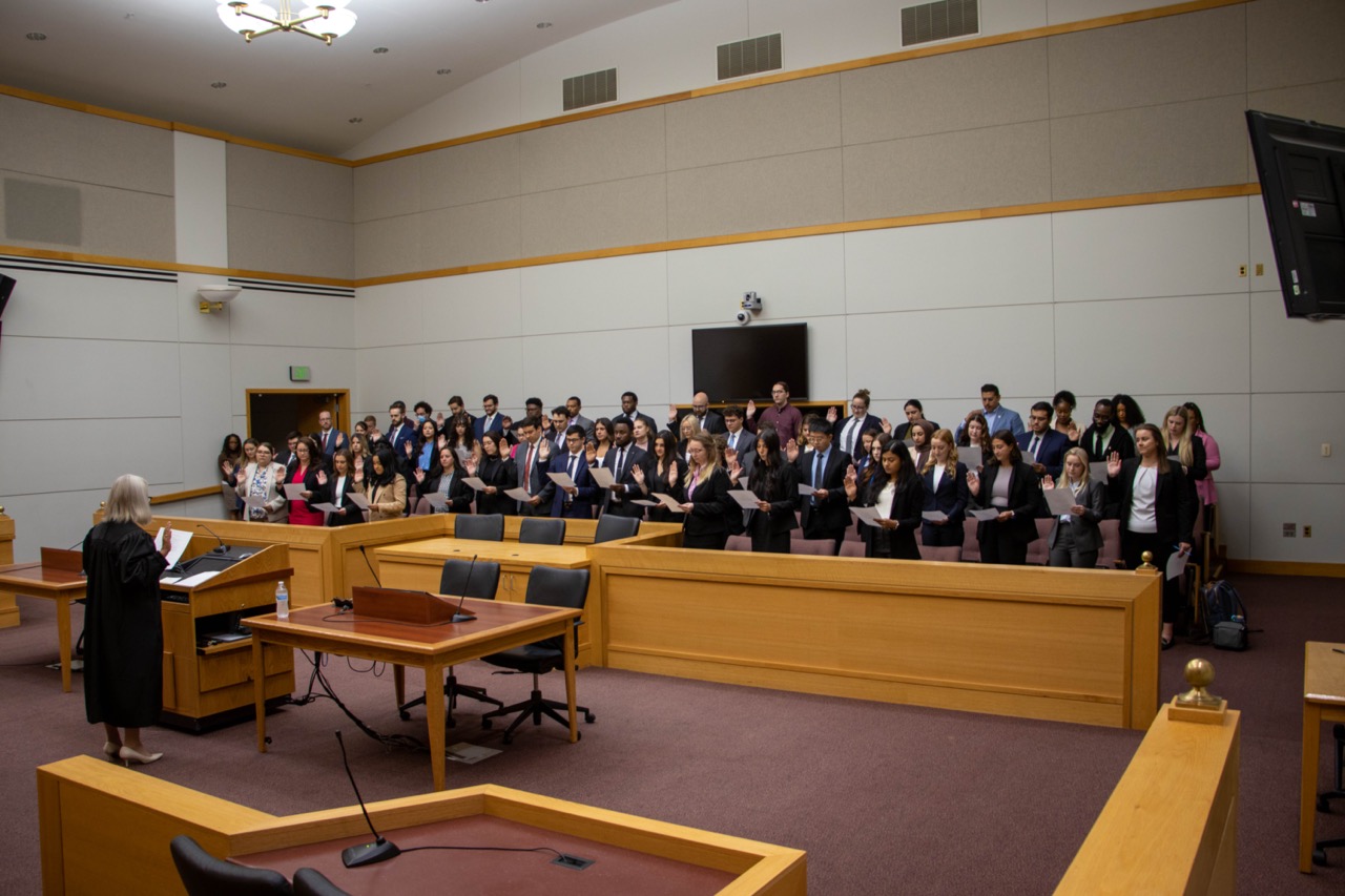 Clinical students taking student practice oath in the MSU Law courtroom