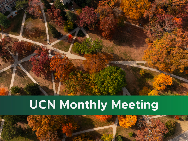 An aerial photo of campus with trees changing color for fall. A green stripe appears across the bottom and white text reads UCN Monthly Meeting.