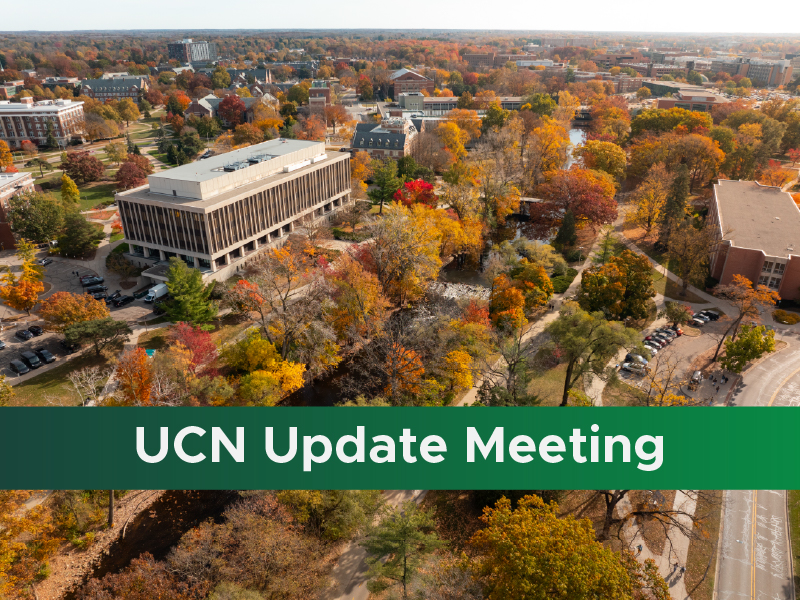 An aerial photo of the Administration Building surrounded by fall colored trees, with a green stripe along the bottom and white text reading "UCN Update Meeting"
