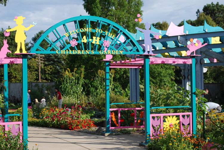 Colorful entry arch to gardens