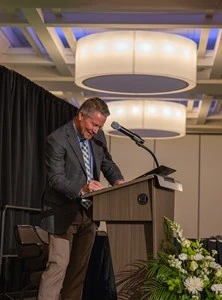 President Guskiewicz at the Podium 