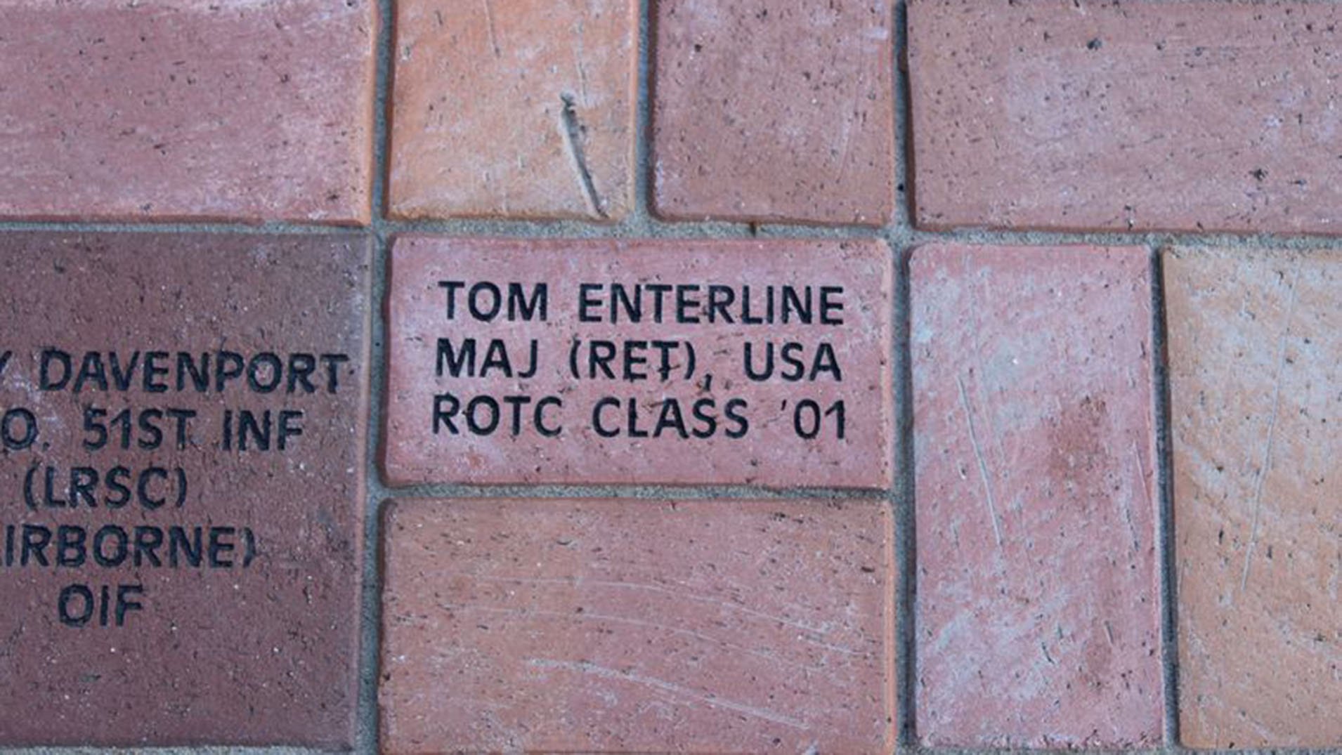 brick with a name inscribed in the Commemorative Plaza walkway 