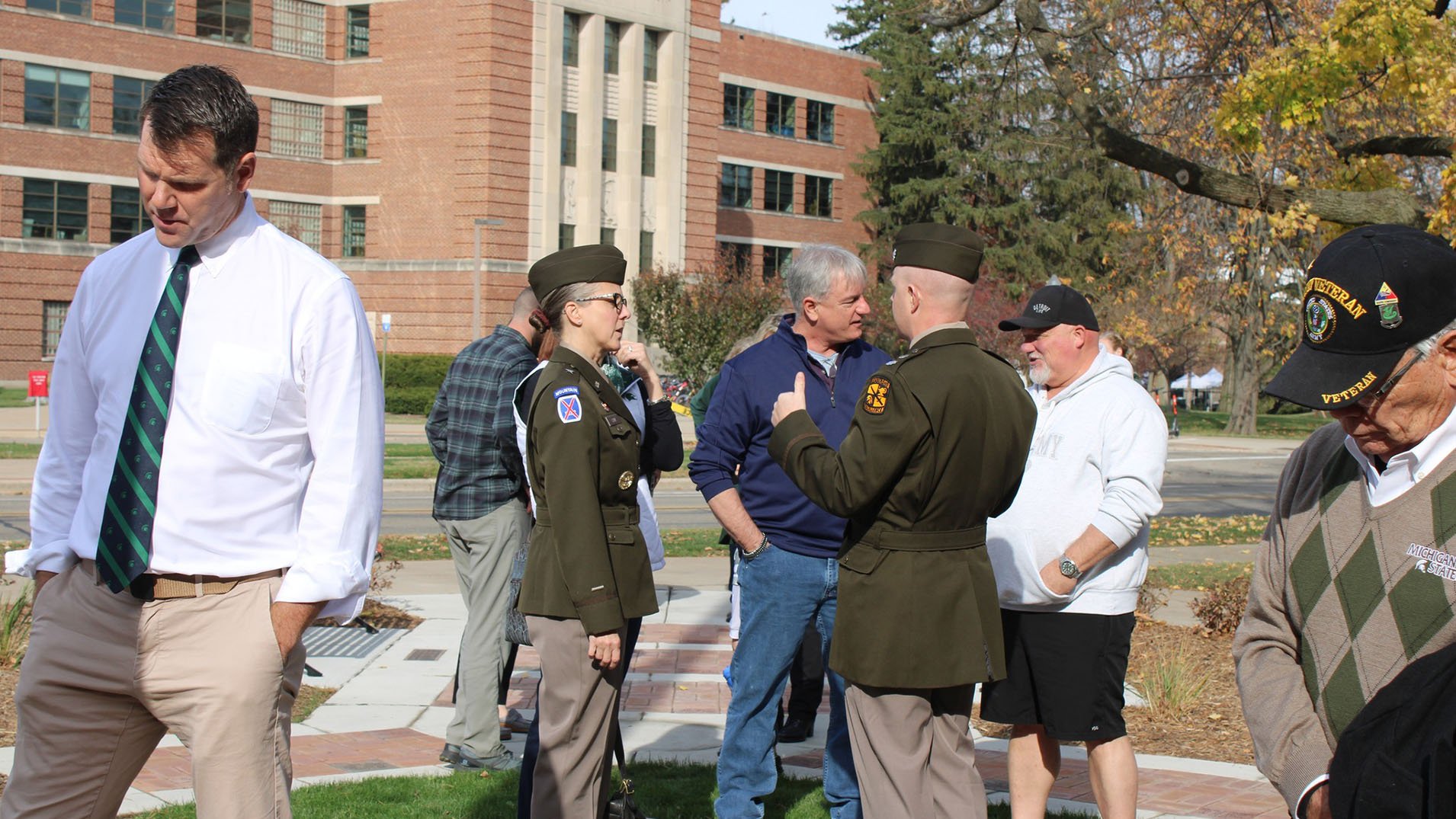 attendees mingle on the plaza during the event