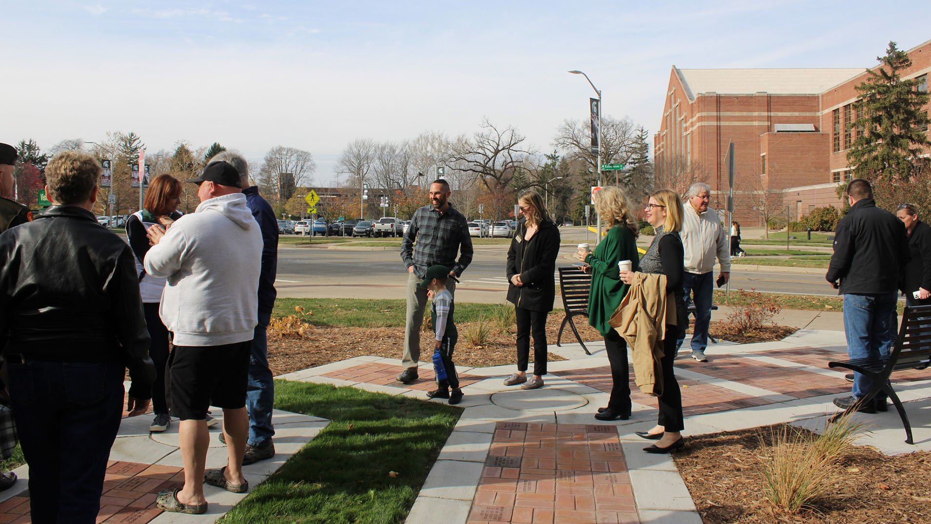 attendees mingle on the plaza at the event