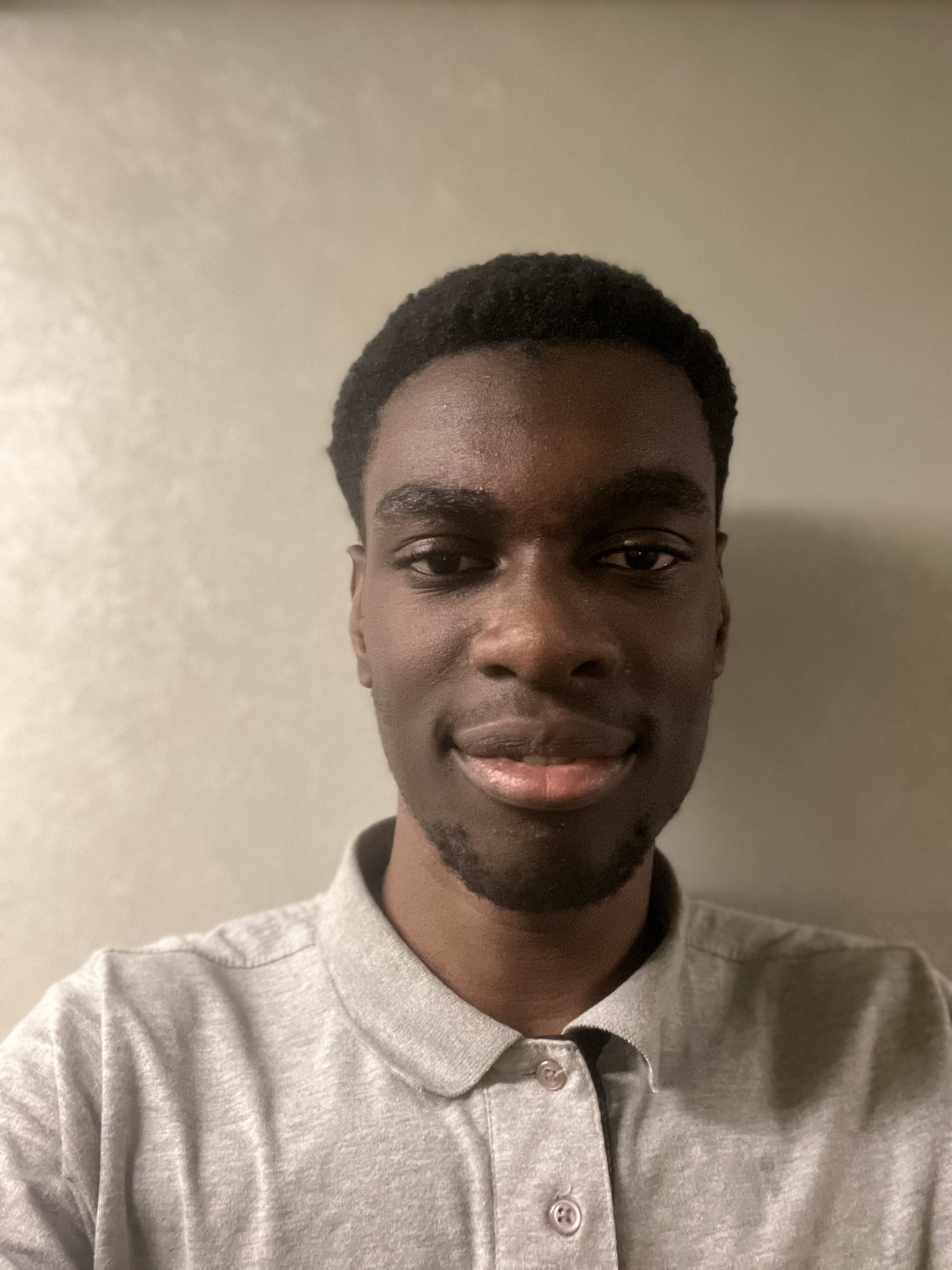 photo of young man in beige shirt