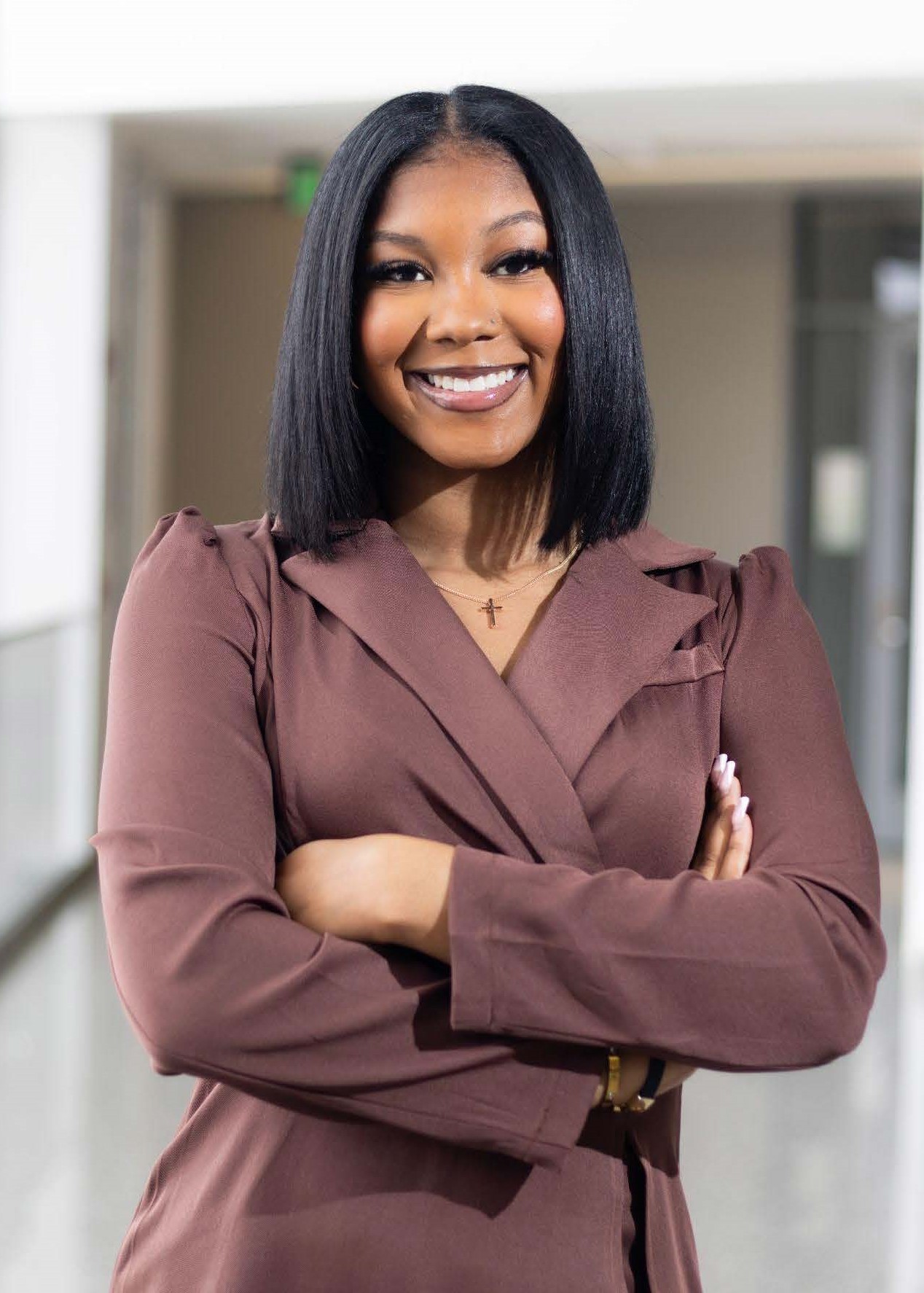 photo of young woman in a business suit