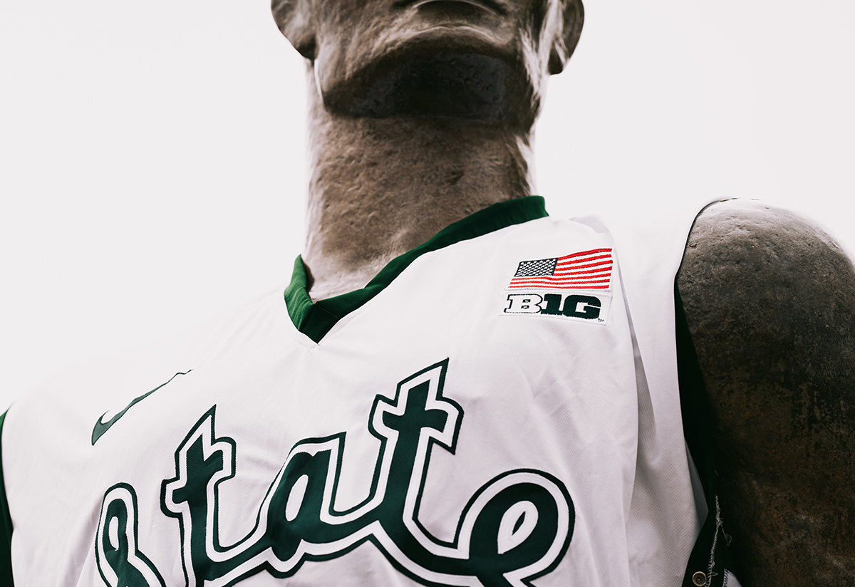 The Spartan statue wearing a basketball jersey