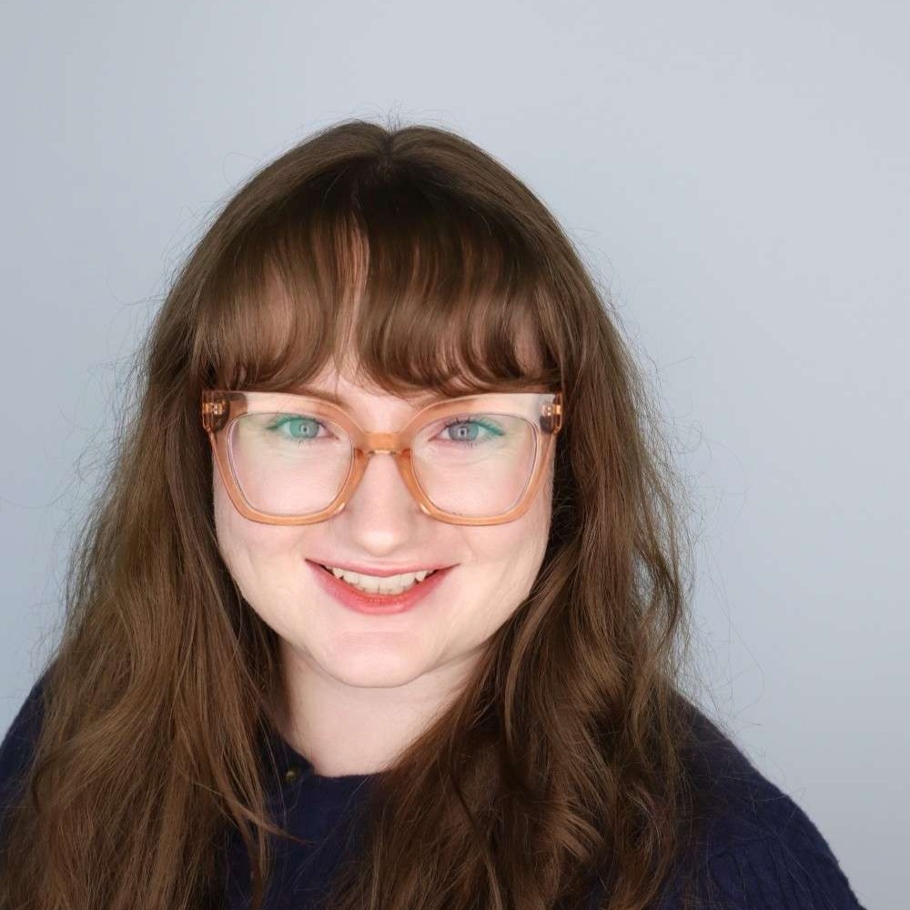 Headshot of Daniella Ferrante in front of an empty wall.