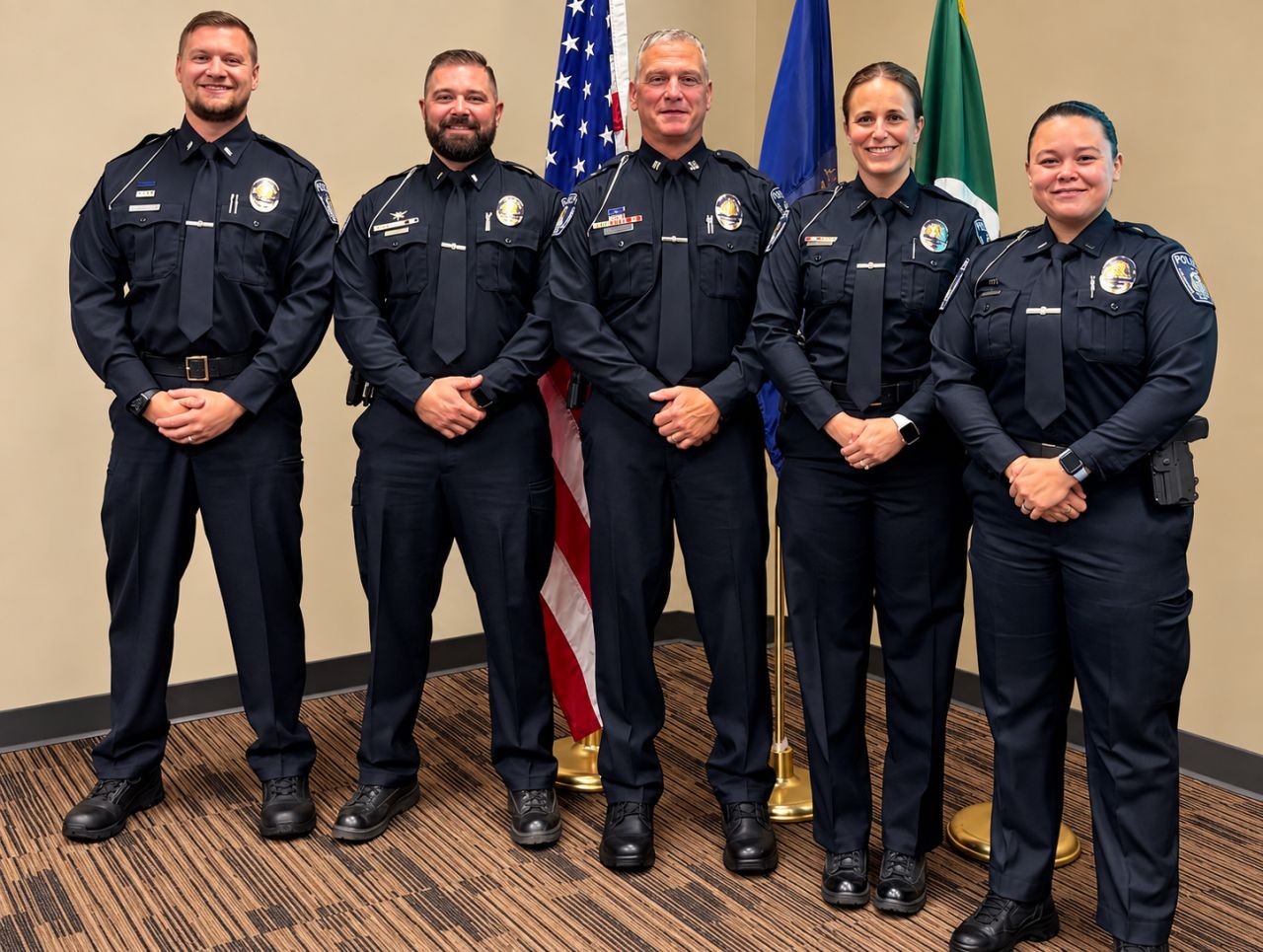 Pictured from left to right:  Lieutenant Aaron Schroeder, Lieutenant Jeremy Patchett, Captain Steve Brandman, Lieutenant Erin Held, and Lieutenant Jessica Mitchell