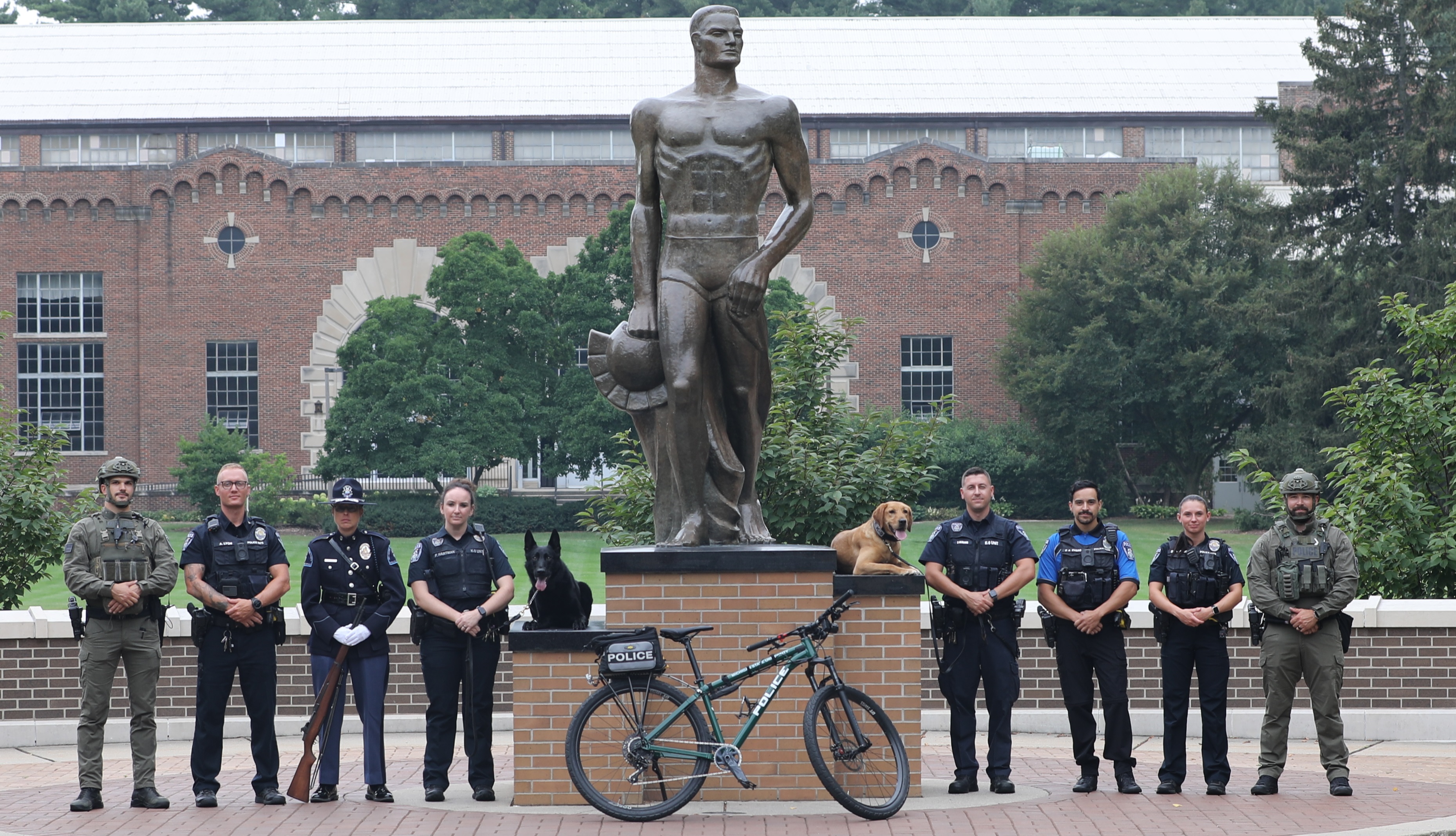 MSU DPPS Patrol, K9, Bike Unit, Color Guard, SRT teams in front of Sparty Statue