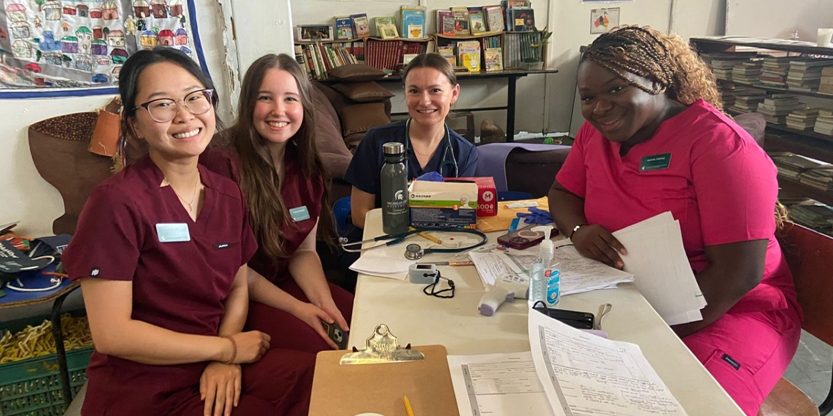 MSU College of Osteopathic Medicine students reviewing notes at a clinic in La Carpio, Costa Rica.