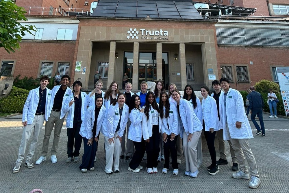 Monika Torkos with her program cohort in front of Trueta Hospital in Barcelona, Spain. 