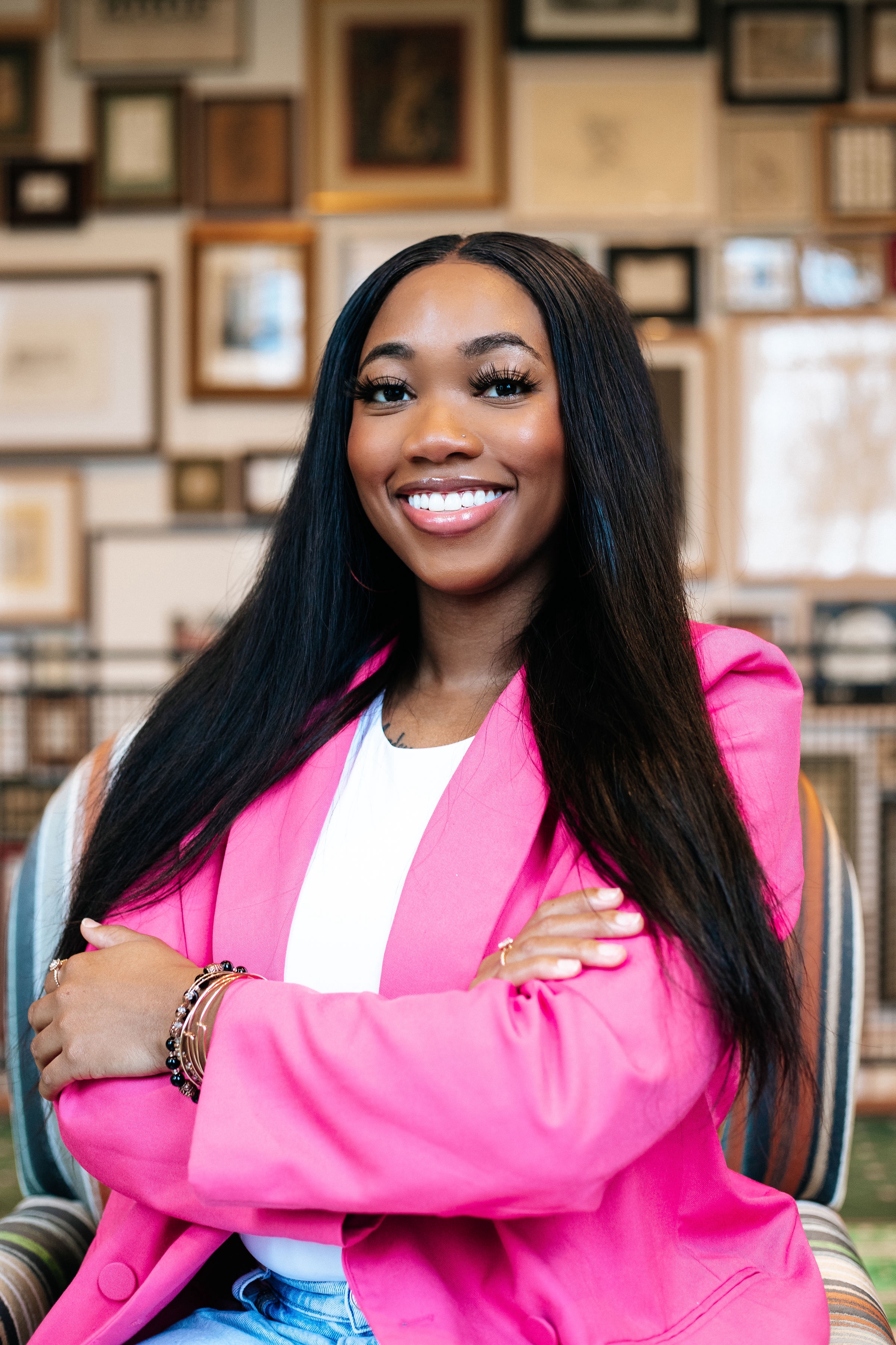 Kaelyn Sanders wearing a pink suit.