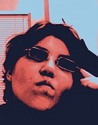 Samantha Noll in sunglasses with rectangle-shaped lenses.