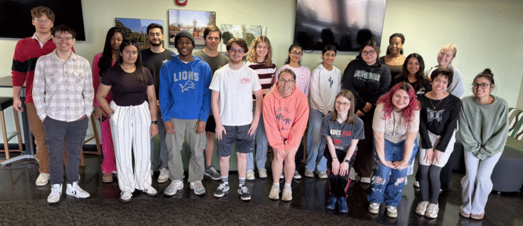 Group of about 20 MSU students smiling at the camera. These students were part of the HST/MC 319 class, Asian American History. 