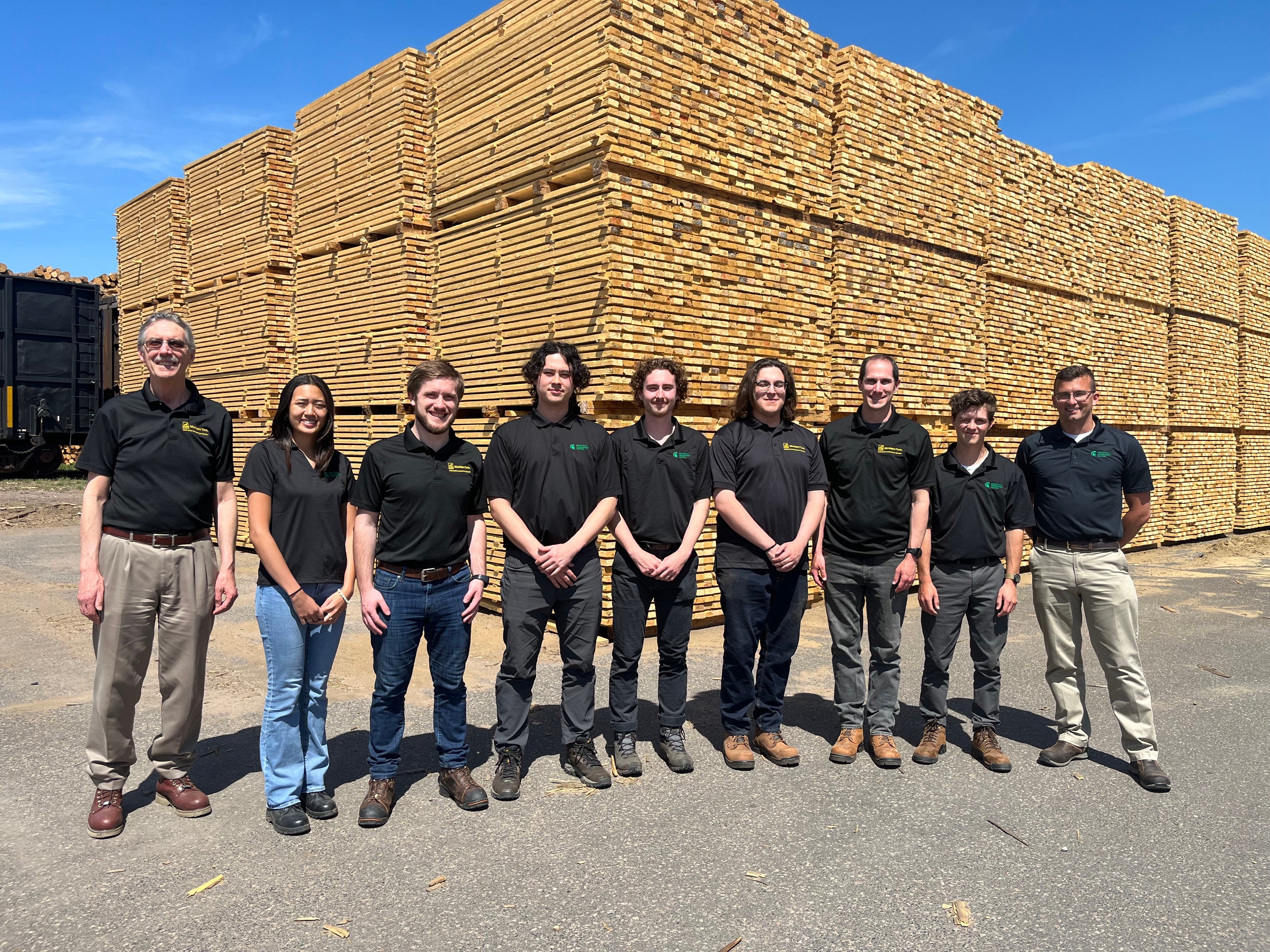 IAC team with timber