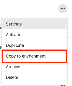 The Copy to environment option on the actions menu is outlined in red