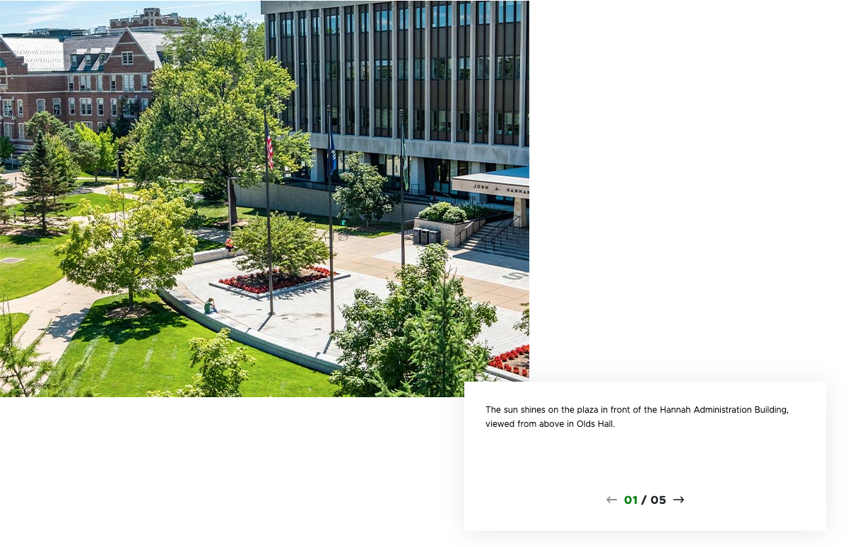 A screenshot of a carousel component using the Center Left Aligned variant. The photo appears on the left with a caption box and pagination arrows on the right. In this slide, a photo of the Hannah Administration Building plaza is shown.