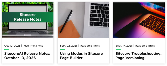Three story cards appear in a row. The left story shows a photo of a laptop sitting on a table in front of green trees. A green banner with white text over the image reads “Sitecore Release Notes.” Below the image, small text reads “Oct. 12, 2026 | Read time 3 mins.” followed by medium bold text reading “SitecoreAI Release Notes: October 13, 2026.” The middle story shows a photo of a laptop keyboard sitting next to orange paper and a black pen. Below the image, small text reads “Sept. 22, 2026 | Read time 1 mins.” followed by medium bold text reading “Using Modes in Sitecore Page Builder.” The right story shows a photo of a nearly closed laptop with a glowing orange and purple screen. Below the image, small text reads “Sept. 17, 2026 | Read time 1 mins.” followed by medium bold text reading “Sitecore Troubleshooting: Page Versioning.” 