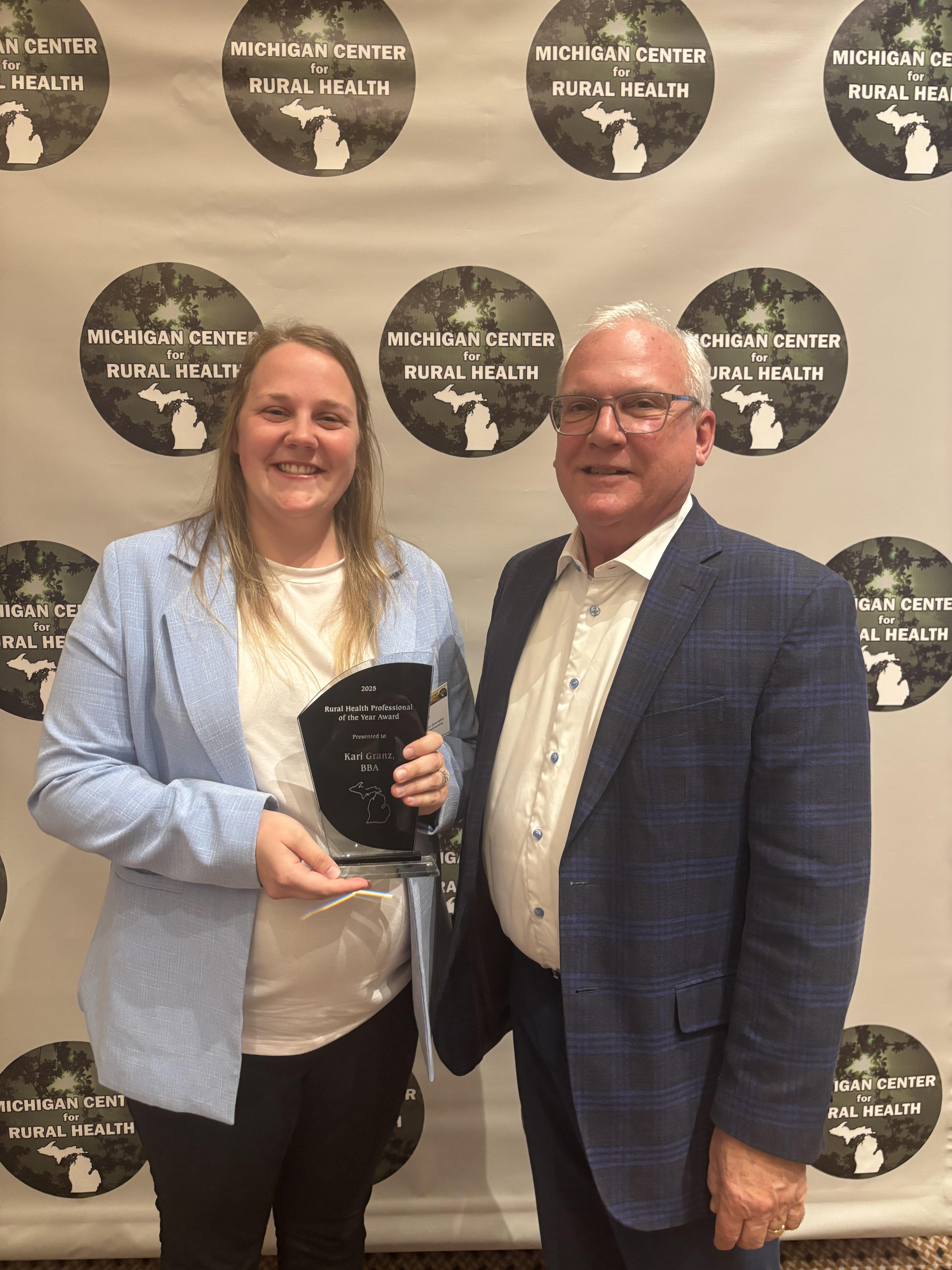 Kari Granz (left), Program and Communication Specialist for the Thumb Community Health Partnership, and John Barnas (right), Executive Director of the Michigan Center for Rural Health.