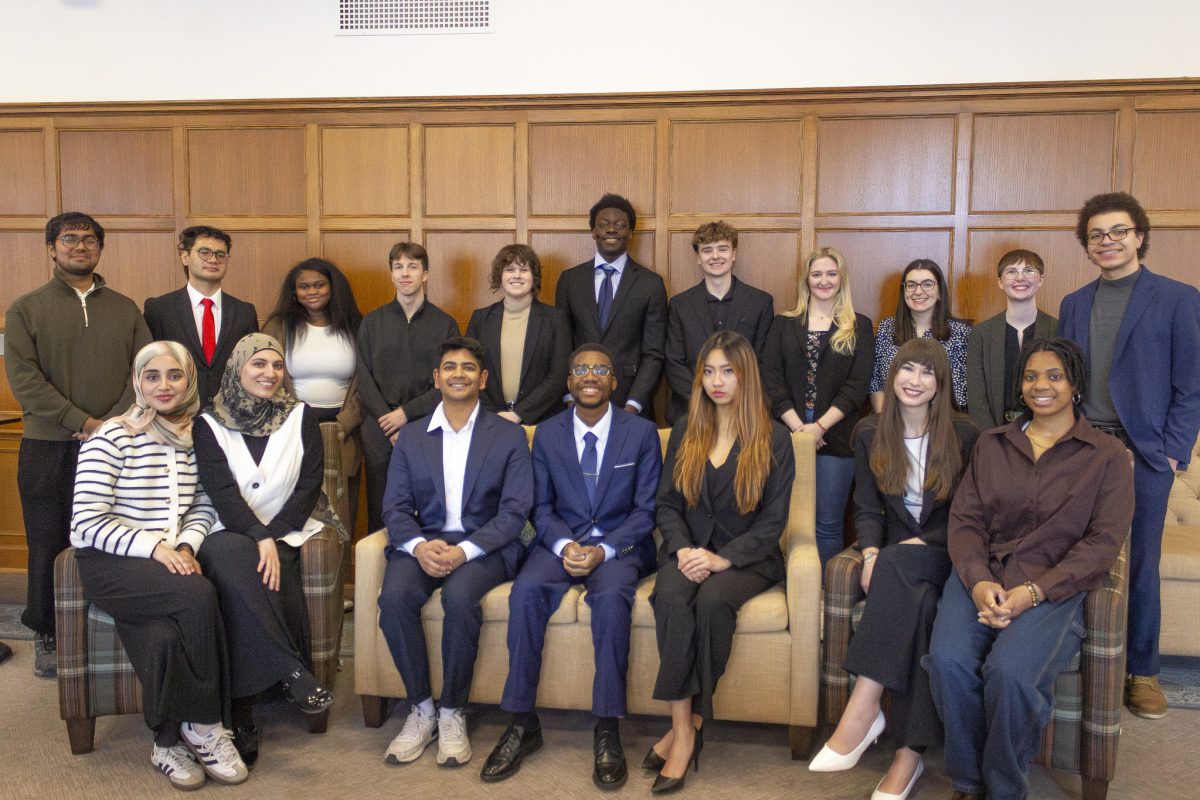 A group of students who presented in the showcase, pose for a photo.